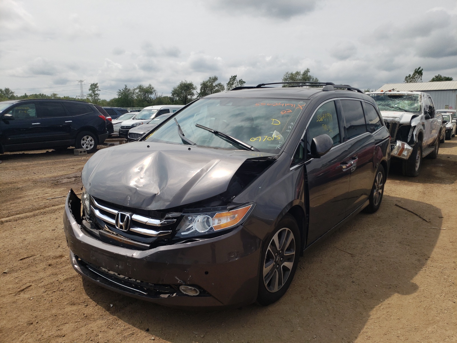 Photo 2 from auction – 2015 HONDA ODYSSEY TO with VIN 5FNRL5H90FB097015