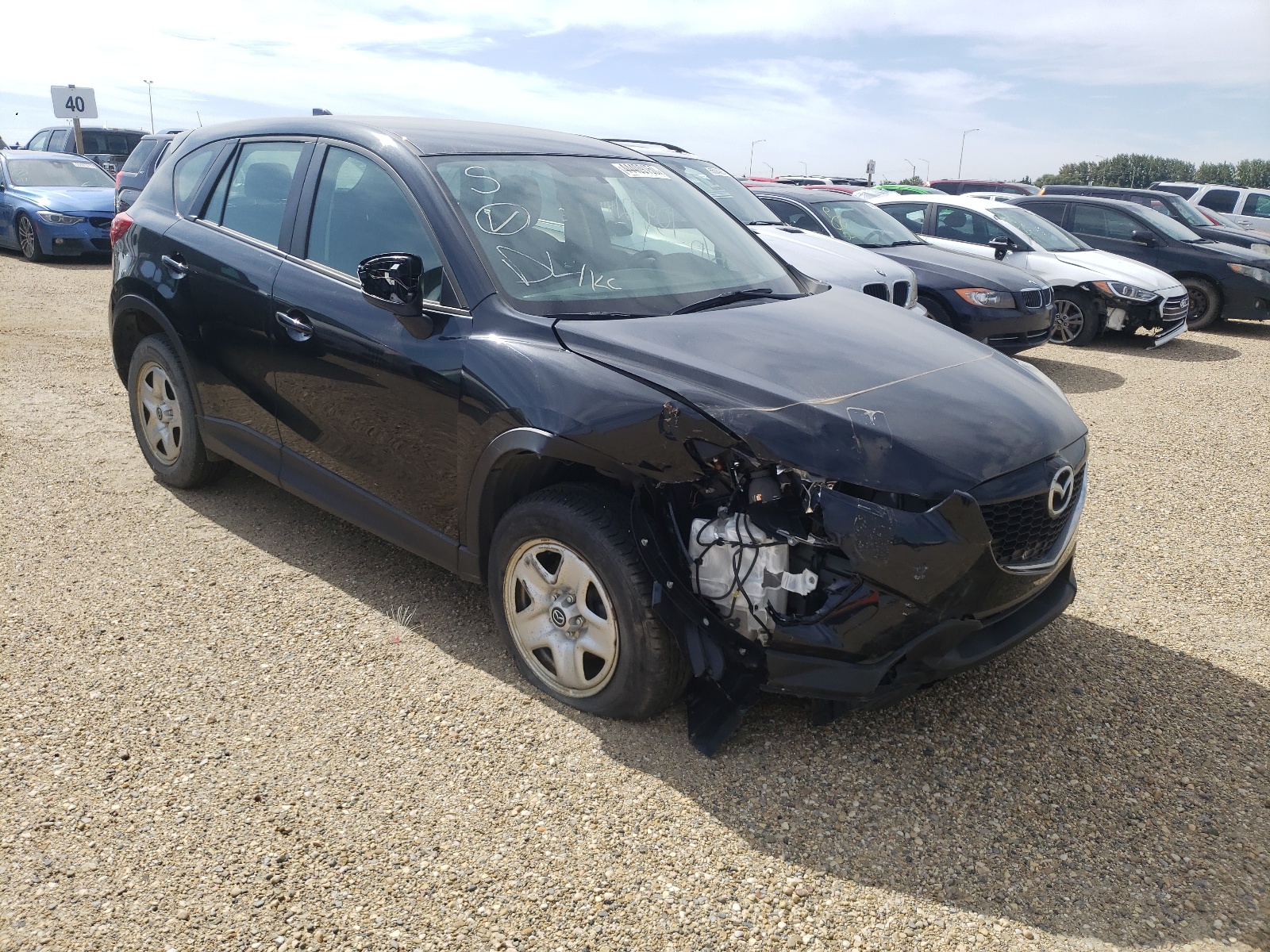 MAZDA CX-5 SPORT 2014 with VIN JM3KE2BE2E0390273 - Photo from auction