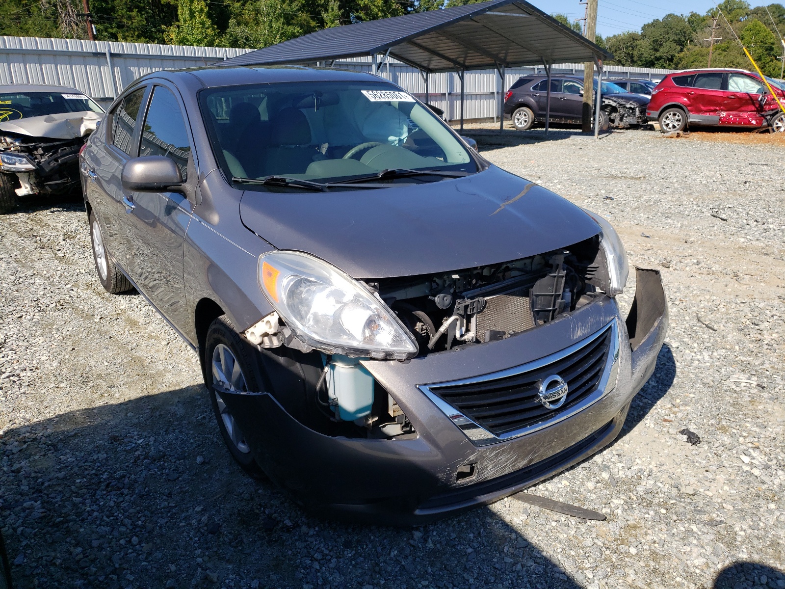 NISSAN VERSA S 2012 with VIN 3N1CN7AP9CL868849 - Photo from auction