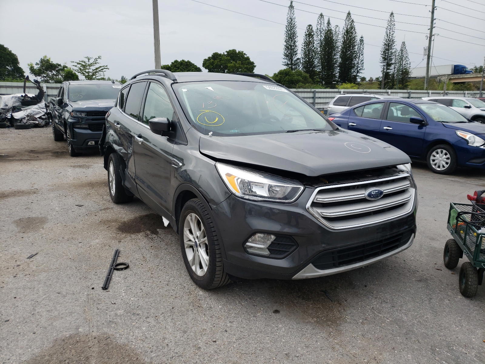 FORD ESCAPE SE 2018 with VIN 1FMCU0GD5JUB61797 - Photo from auction