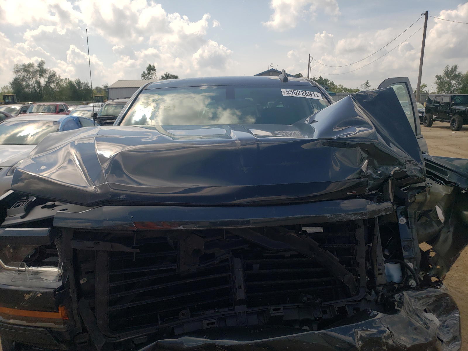 Photo 7 from auction – 2018 CHEVROLET SILVERADO with VIN 3GCUKREC8JG474097