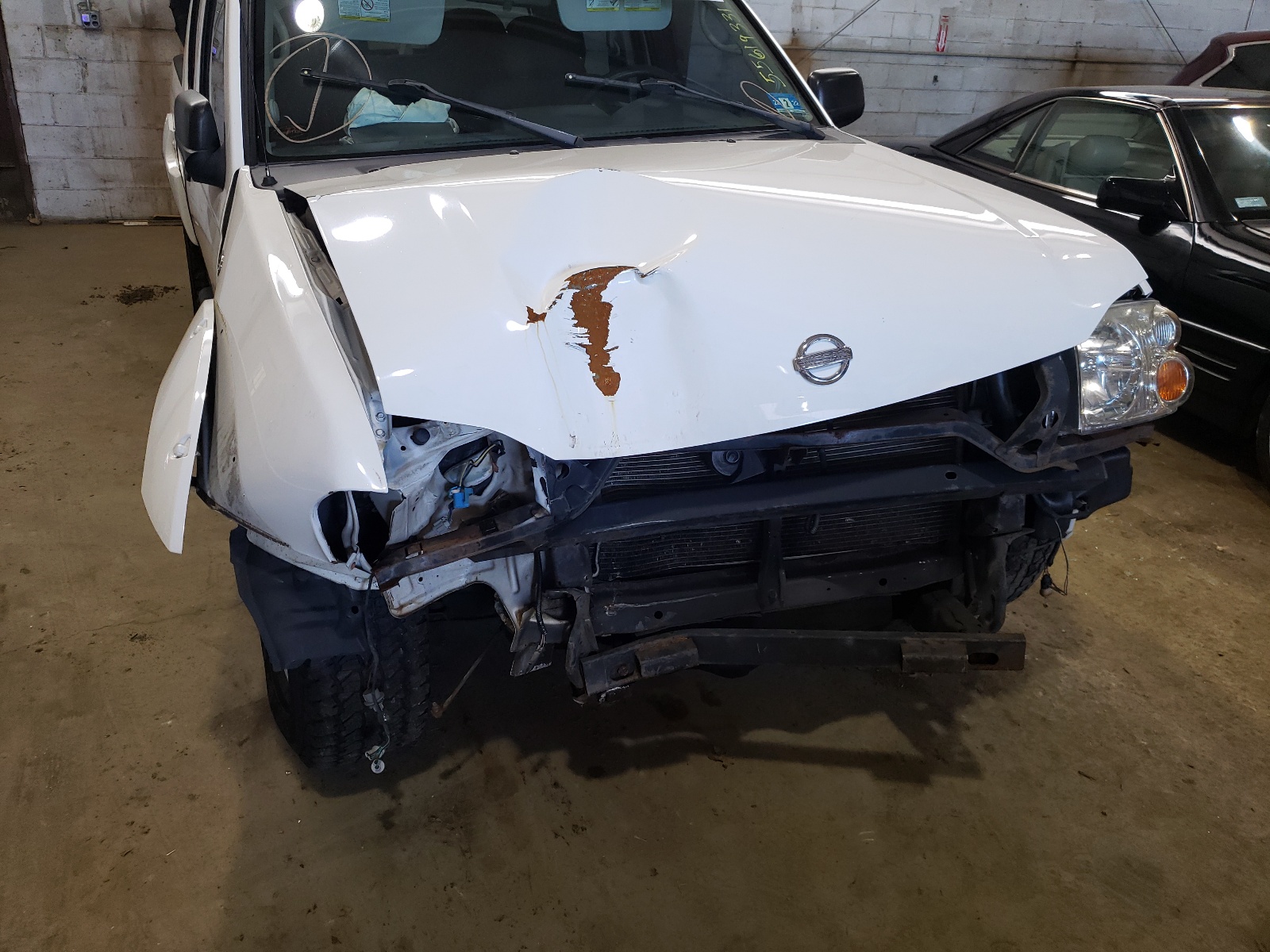 Photo 9 from auction – 2003 NISSAN FRONTIER C with VIN 1N6MD27YX3C400080