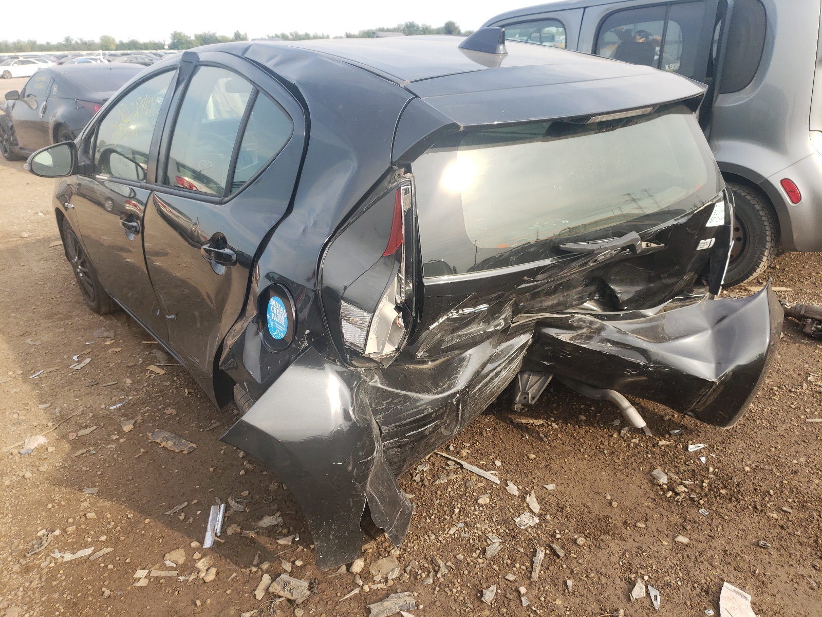 Photo 3 from auction – 2015 TOYOTA PRIUS C with VIN JTDKDTB34F1581317