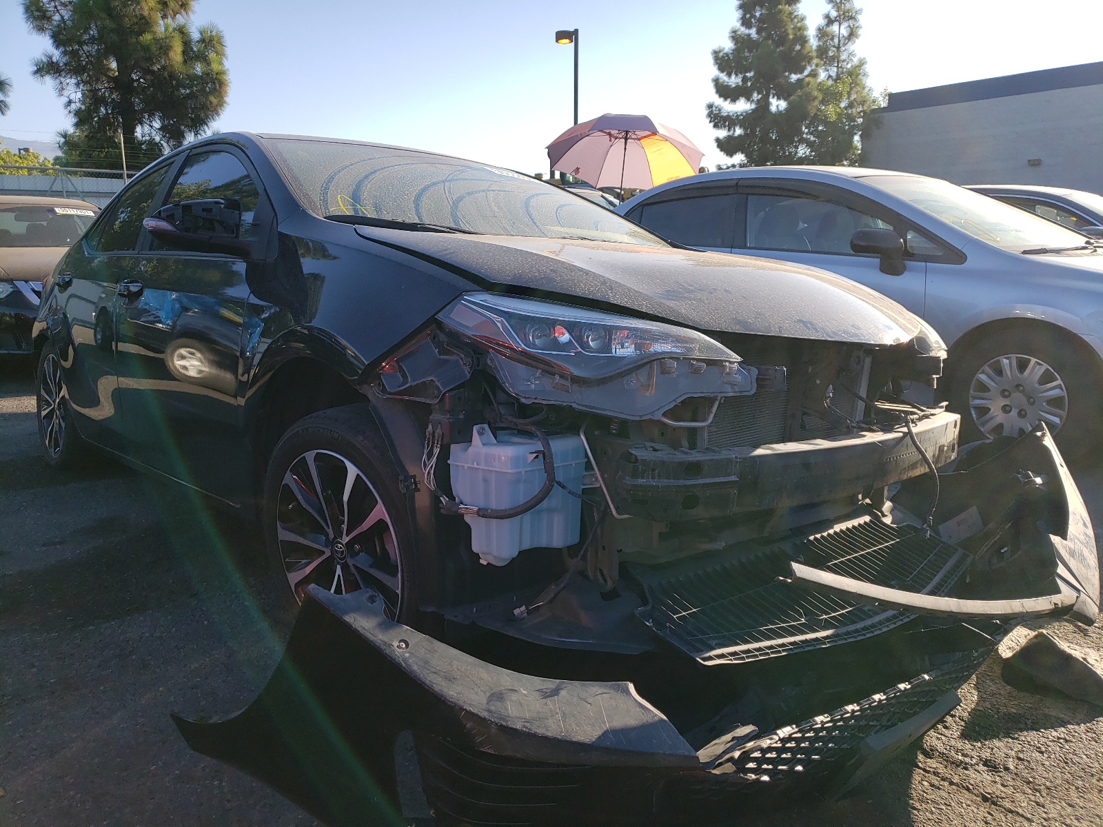 TOYOTA COROLLA L 2017 with VIN 5YFBURHE8HP621697 - Photo from auction