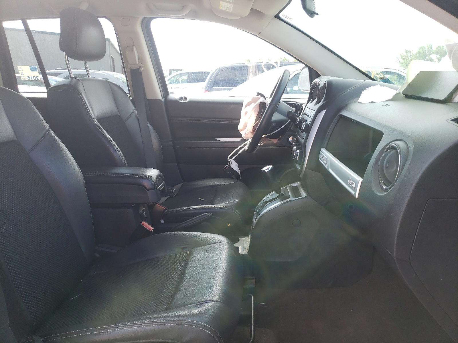 Photo 5 from auction – 2014 JEEP COMPASS LA with VIN 1C4NJCEB8ED888088