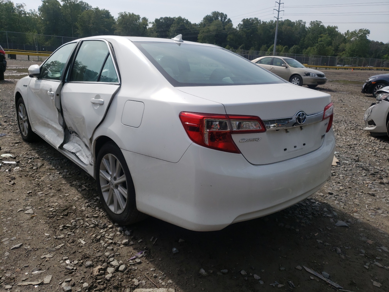 Photo 3 from auction – 2012 TOYOTA CAMRY HYBR with VIN 4T1BD1FK9CU038864
