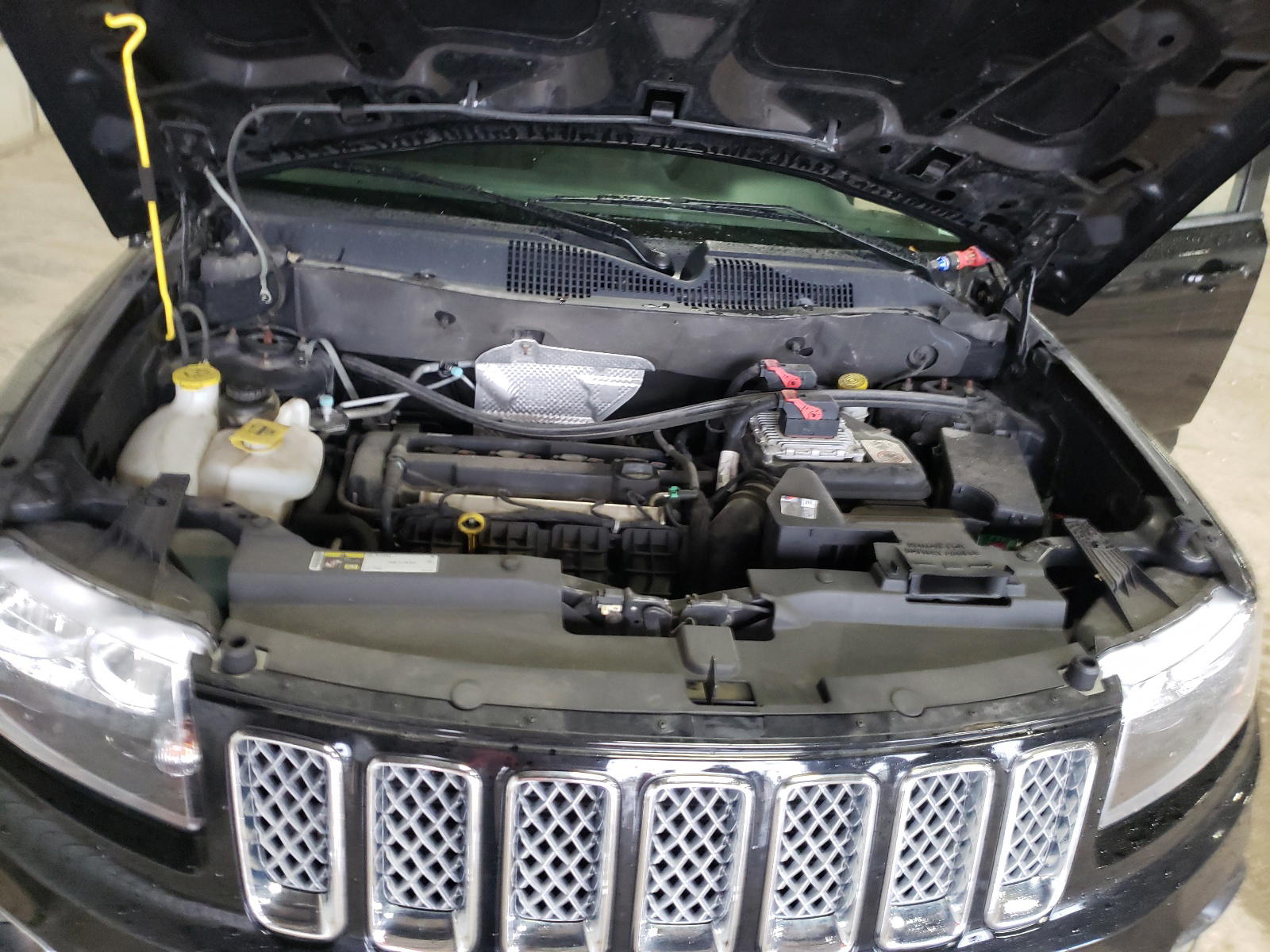 Photo 7 from auction – 2014 JEEP COMPASS LA with VIN 1C4NJCEA6ED758589