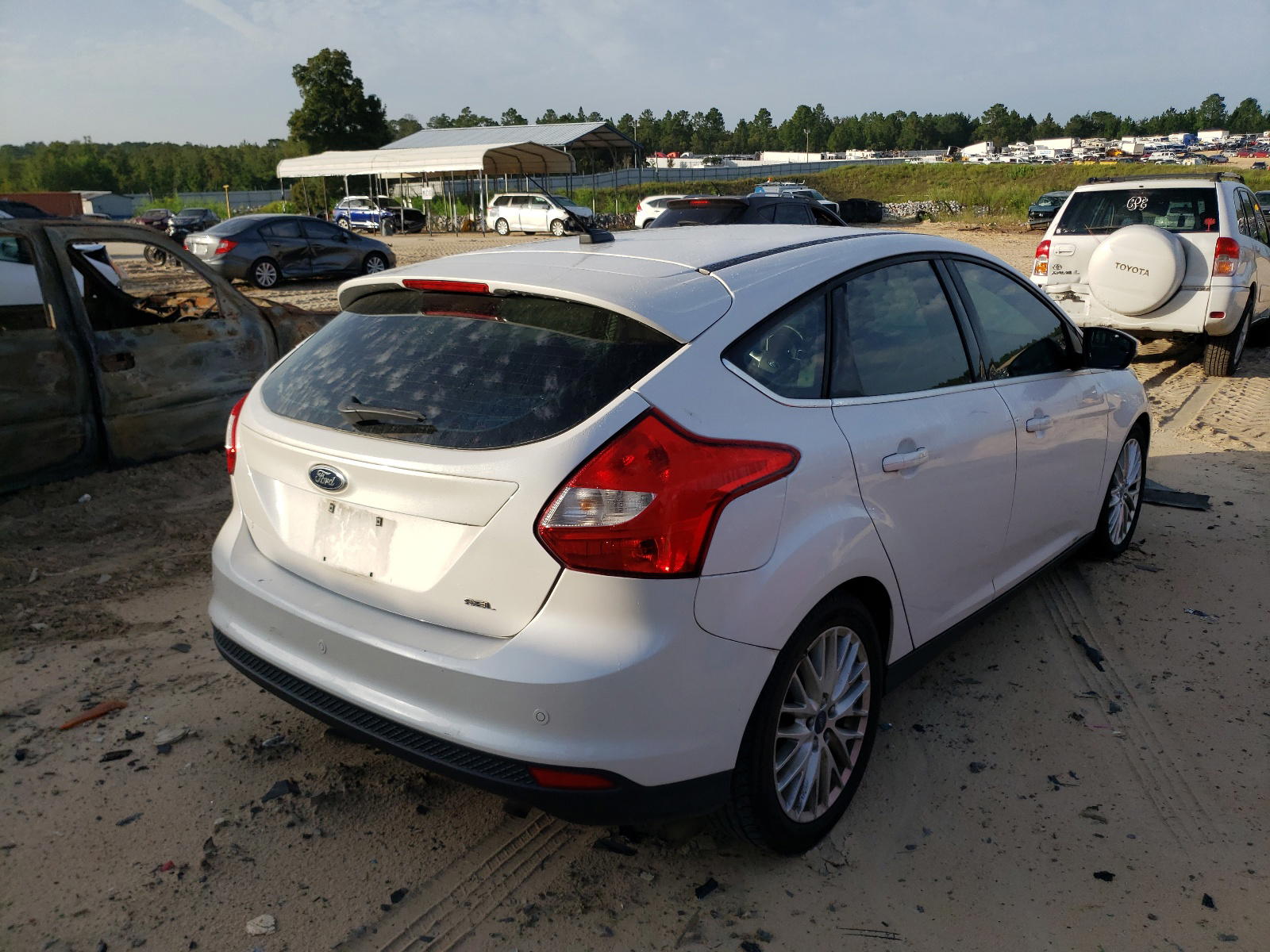 Photo 4 from auction – 2012 FORD FOCUS SEL with VIN 1FAHP3M28CL289617