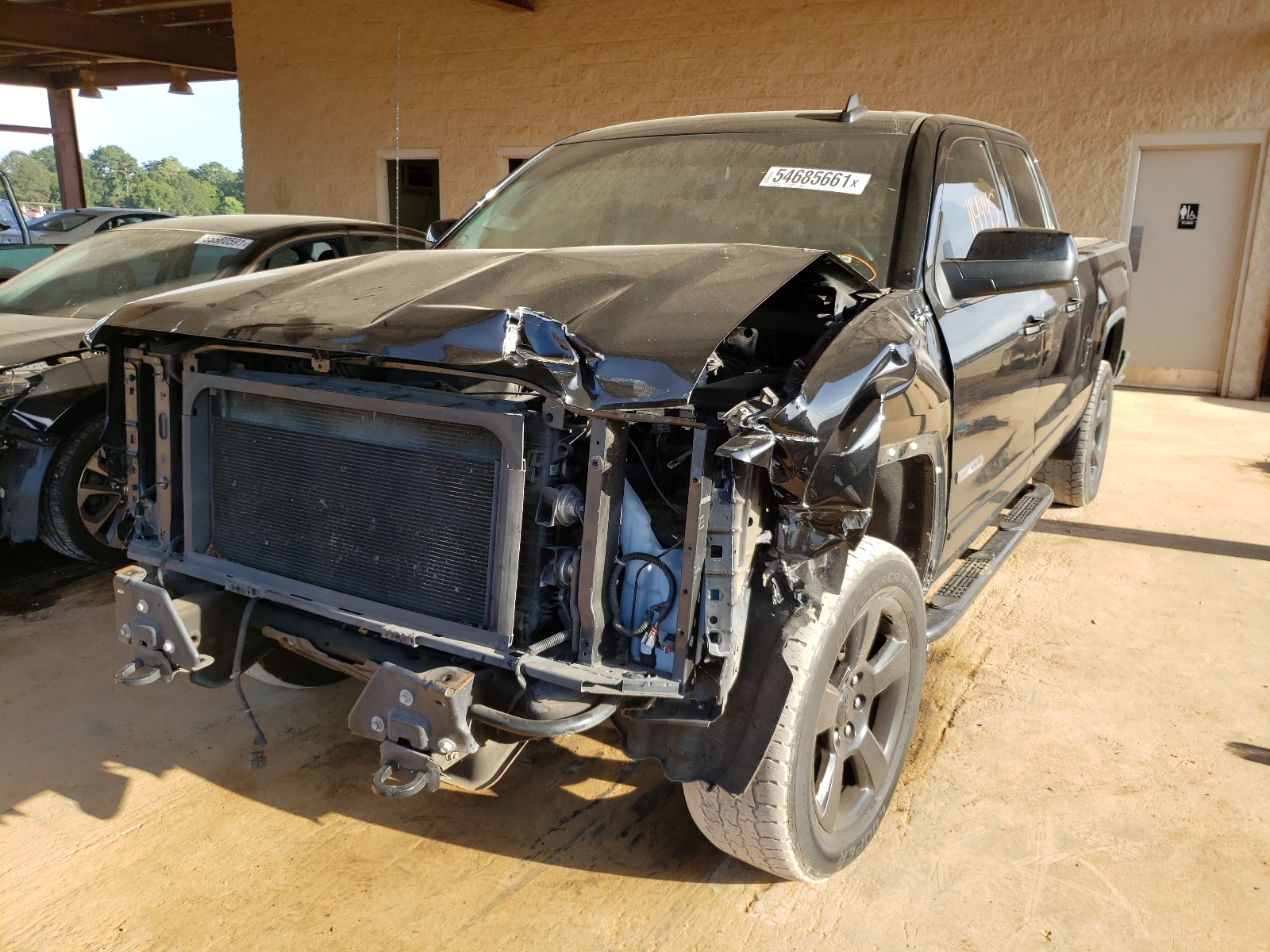 Photo 2 from auction – 2016 GMC SIERRA K15 with VIN 1GTV2LEH6GZ254463