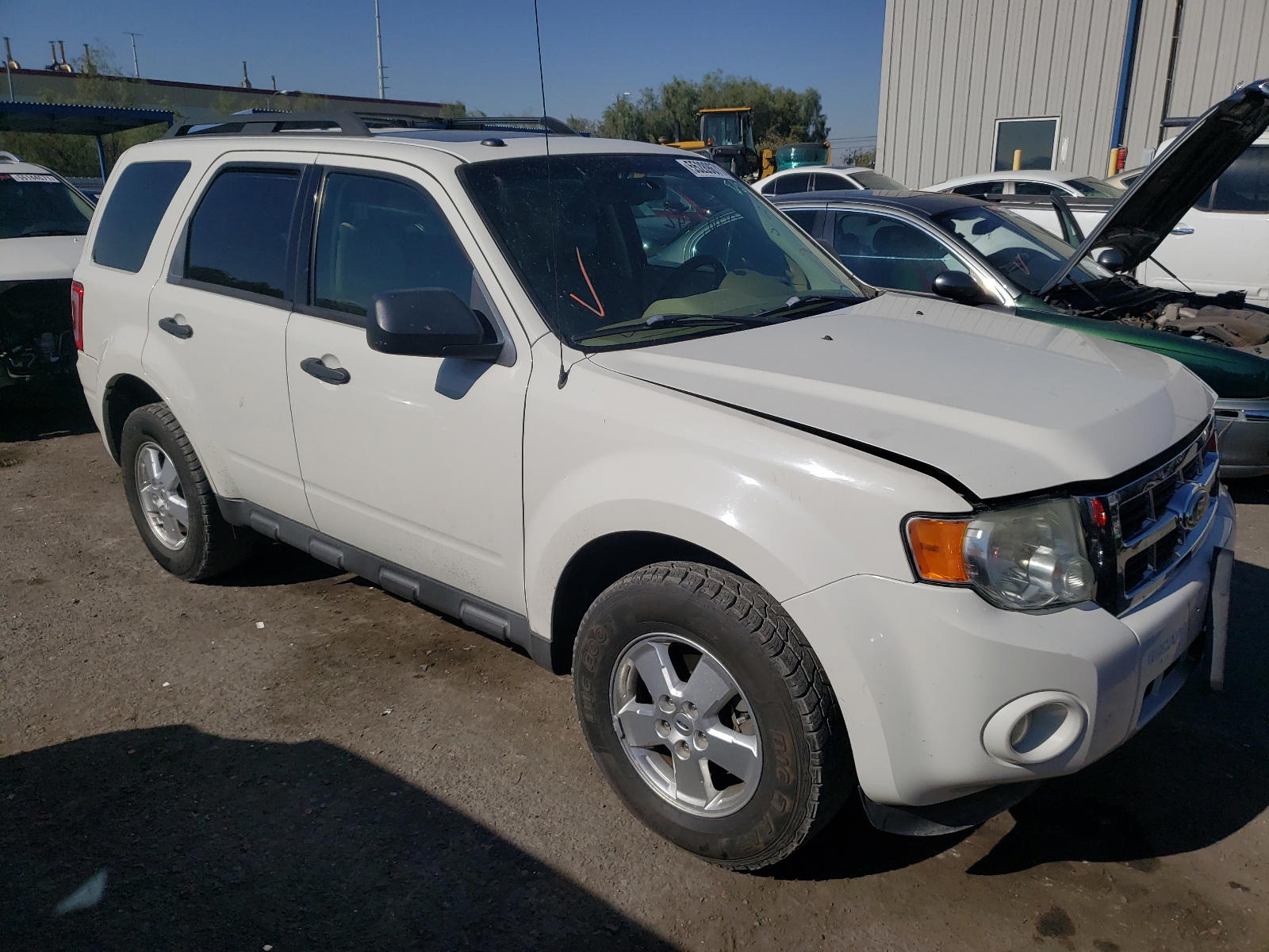 FORD ESCAPE XLT 2011 with VIN 1FMCU9DG1BKA51099 - Photo from auction