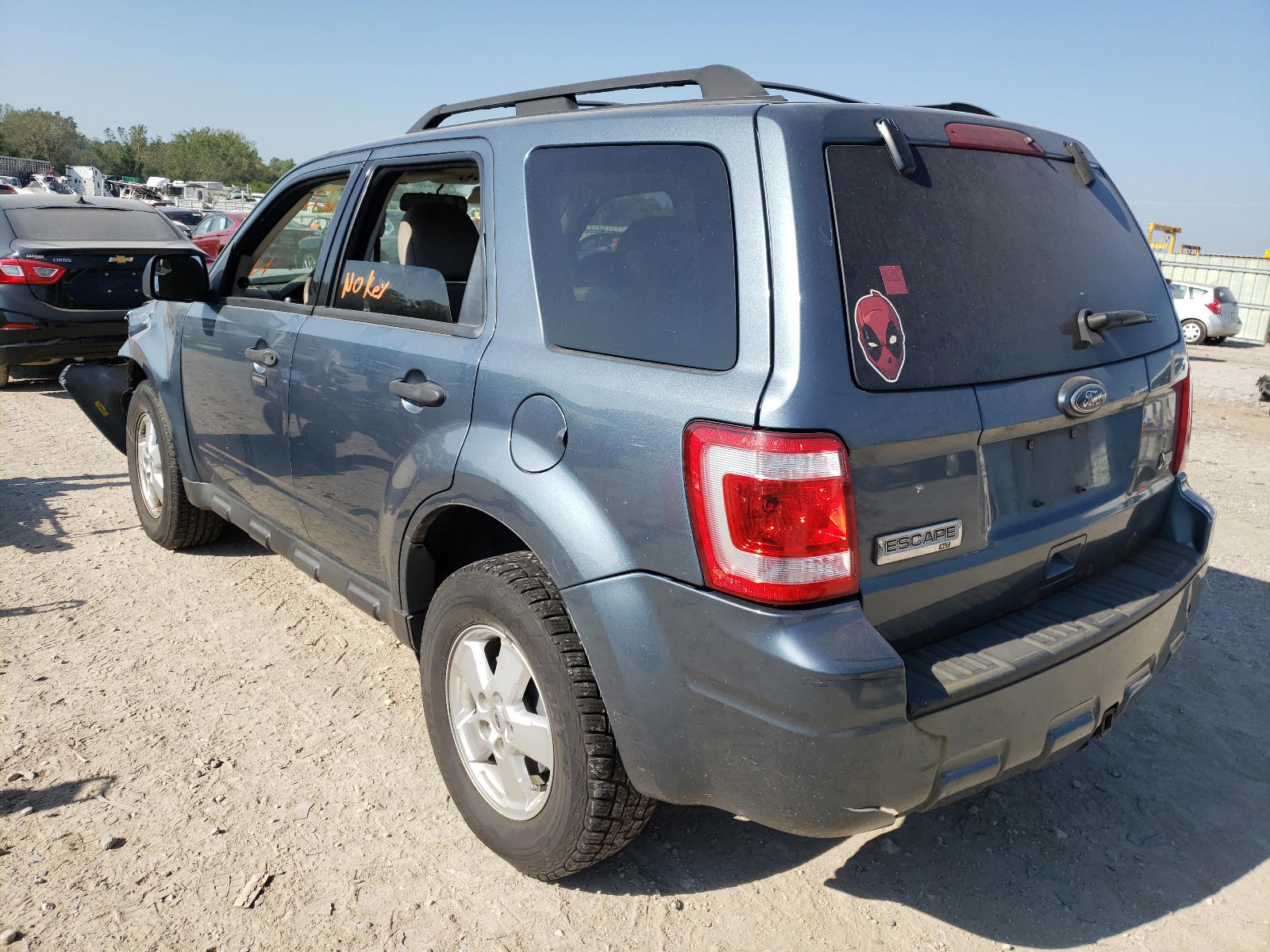 Photo 3 from auction – 2010 FORD ESCAPE XLT with VIN 1FMCU9DG6AKB64609