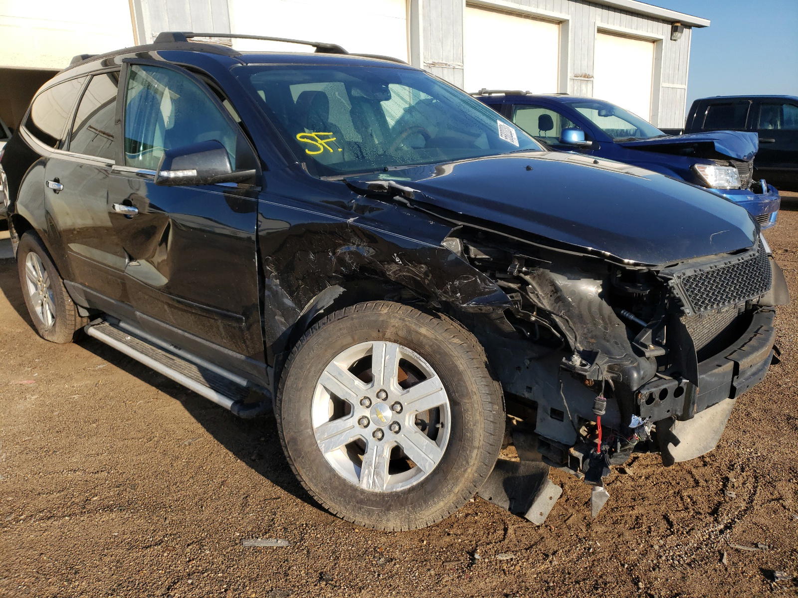 Photo 9 from auction – 2011 CHEVROLET TRAVERSE L with VIN 1GNKRJED0BJ197854