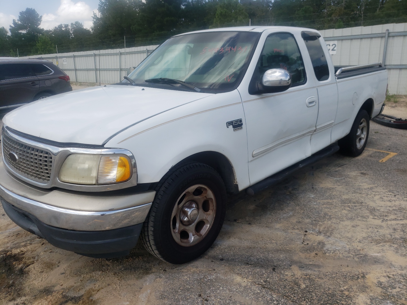 Photo 9 from auction – 2001 FORD F150 with VIN 1FTRX17L31NA58925