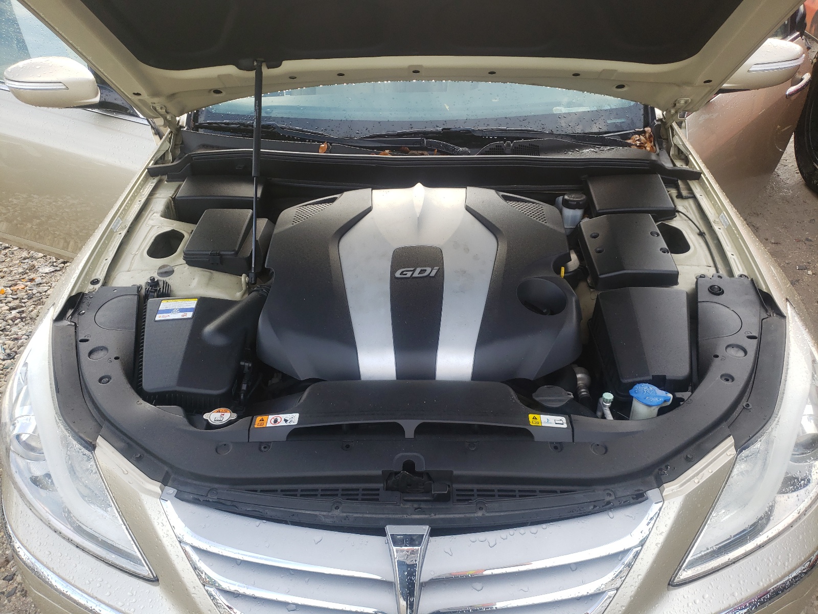 Photo 7 from auction – 2012 HYUNDAI GENESIS 3. with VIN KMHGC4DD5CU181082