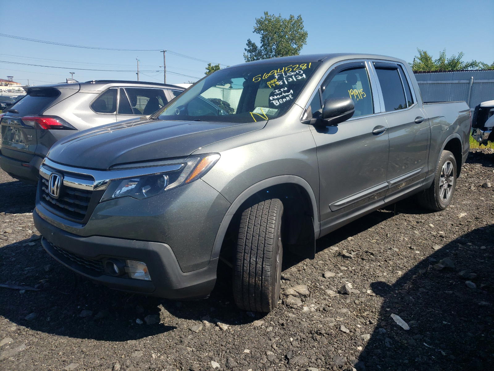 Photo 2 from auction – 2017 HONDA RIDGELINE with VIN 5FPYK3F56HB008173