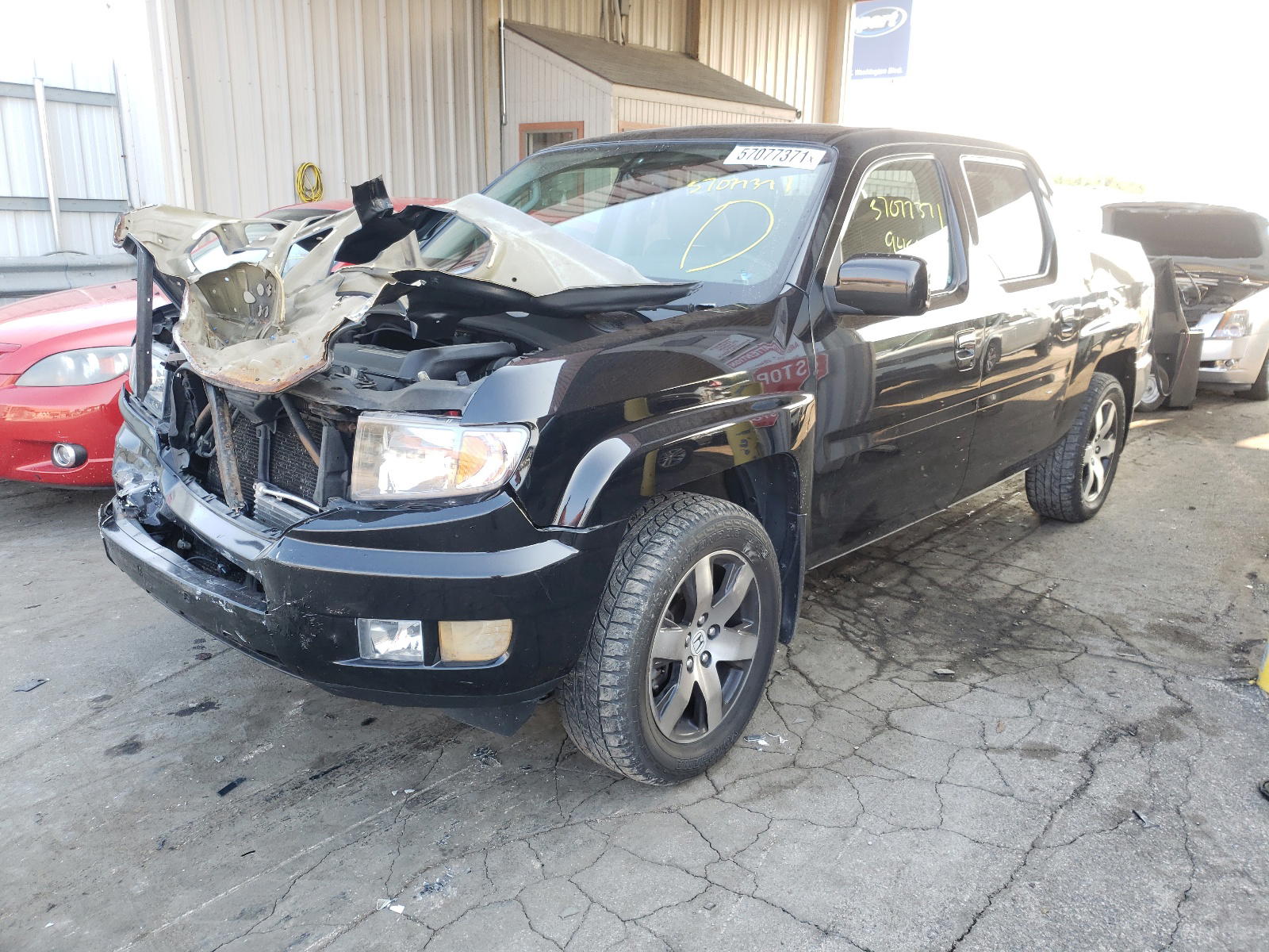 Photo 2 from auction – 2014 HONDA RIDGELINE with VIN 5FPYK1F61EB005786
