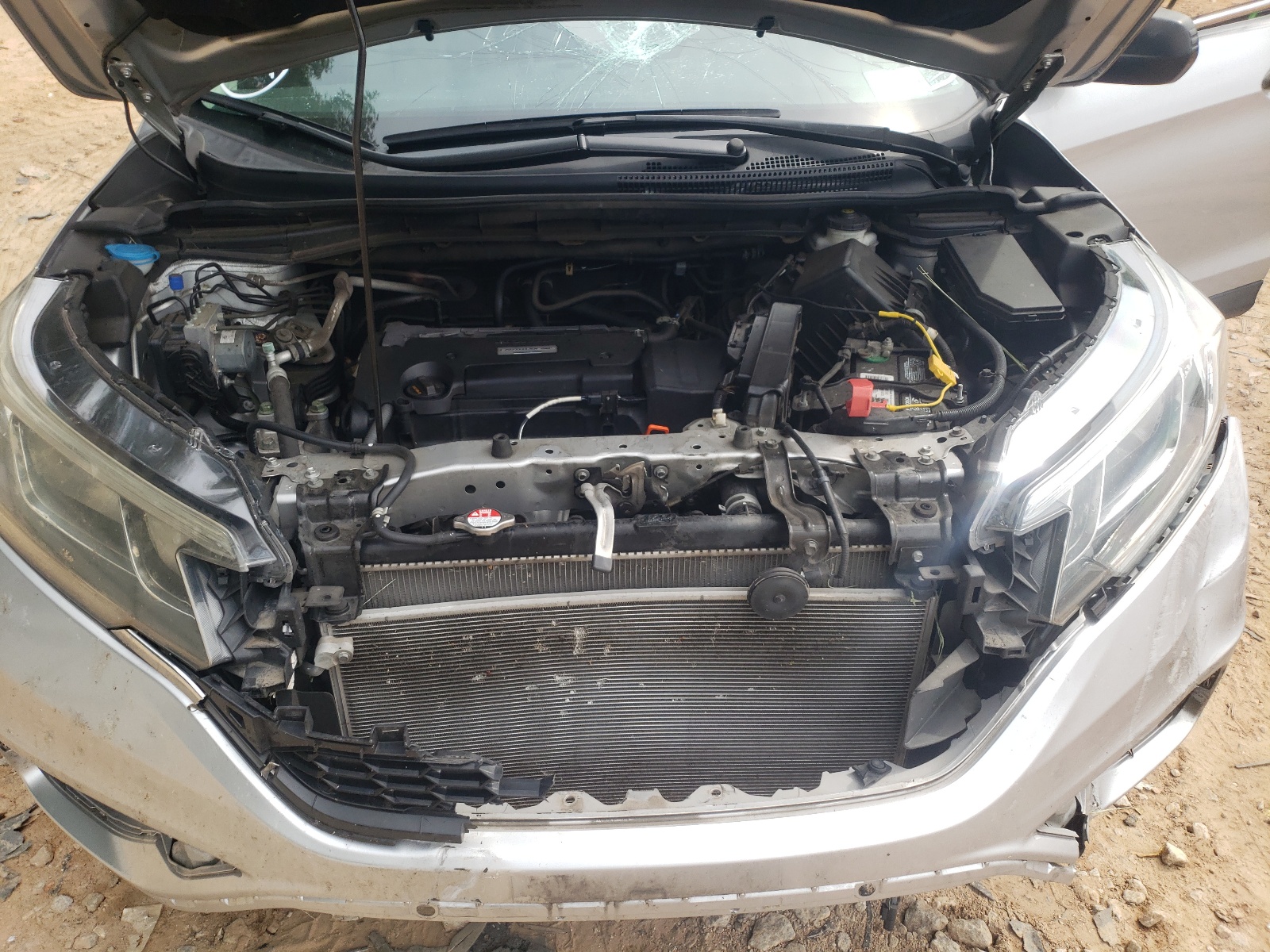 Photo 7 from auction – 2016 HONDA CR-V LX with VIN 5J6RM4H31GL129238