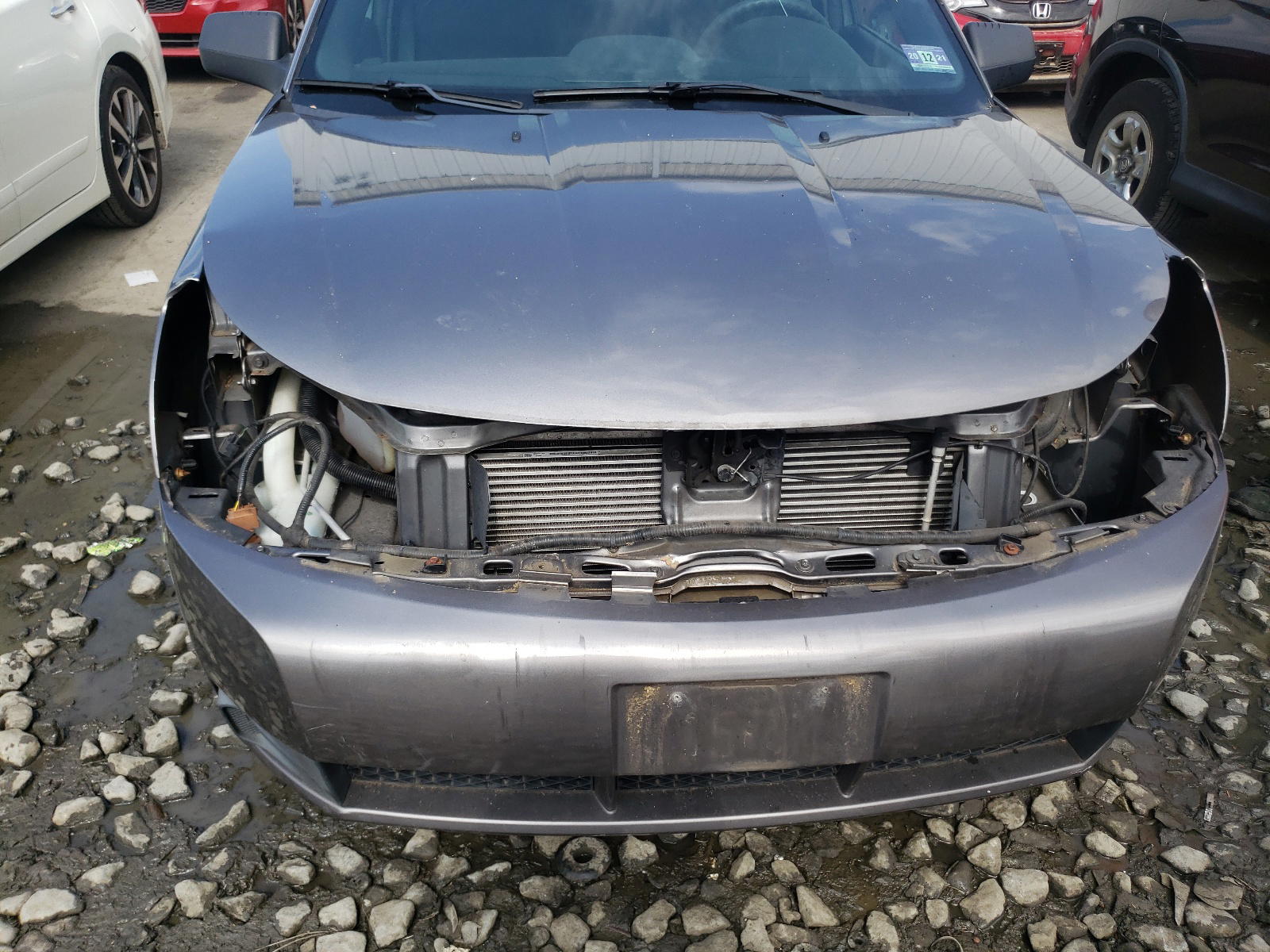Photo 9 from auction – 2011 FORD FOCUS SE with VIN 1FAHP3FN8BW139642
