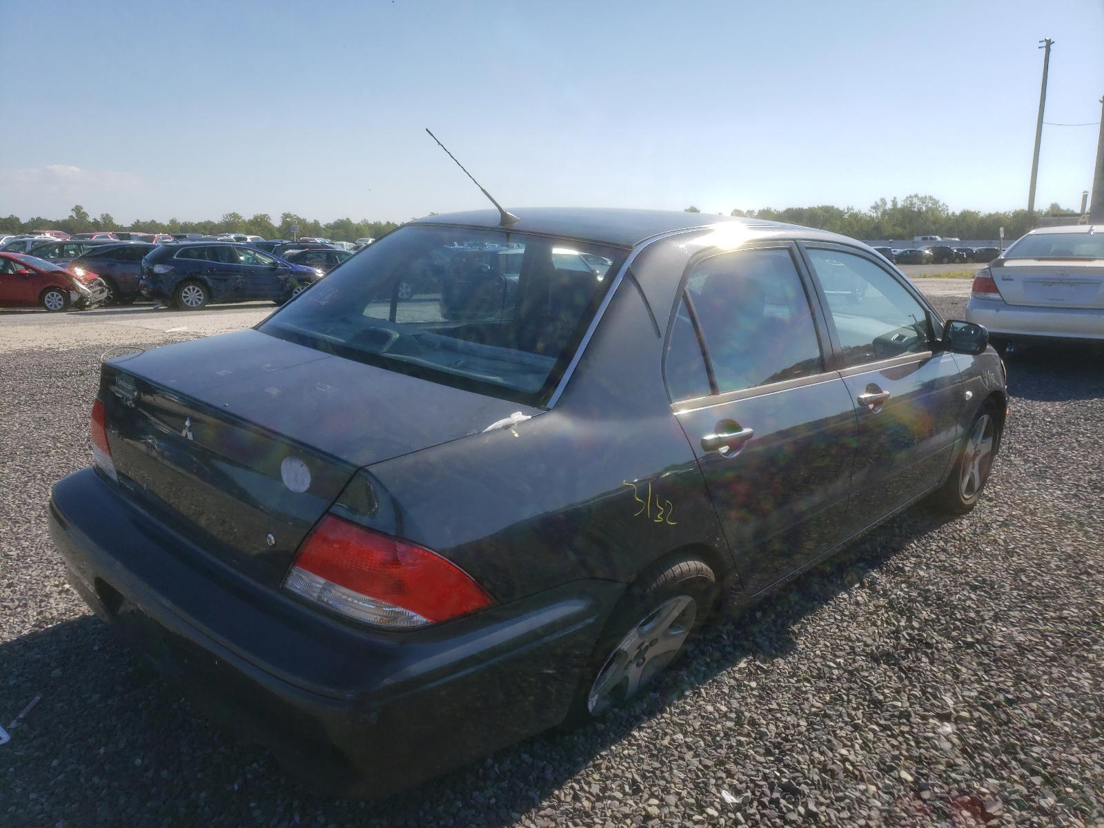 Photo 4 from auction – 2003 MITSUBISHI LANCER with VIN JA3AJ26E03U074028