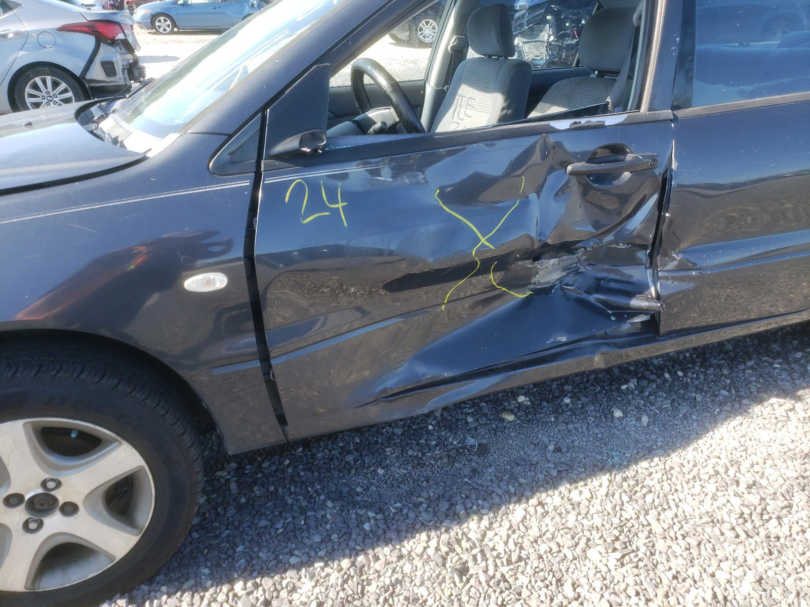 Photo 9 from auction – 2003 MITSUBISHI LANCER with VIN JA3AJ26E03U074028