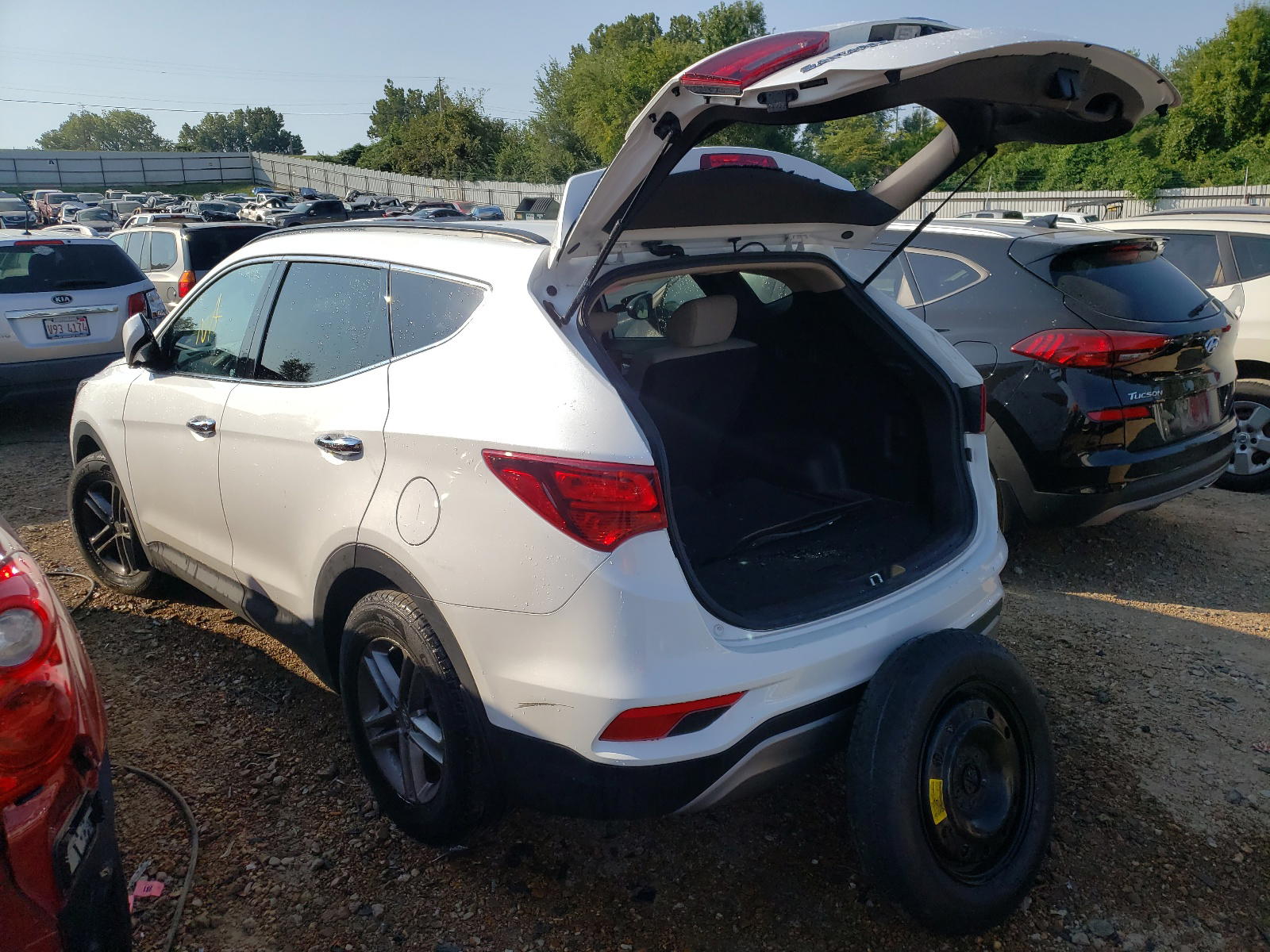 Photo 3 from auction – 2017 HYUNDAI SANTA FE S with VIN 5NMZU3LB9HH018969