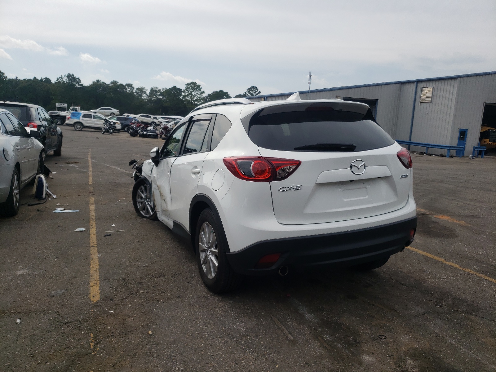 Photo 3 from auction – 2016 MAZDA CX-5 TOURI with VIN JM3KE2CYXG0870492
