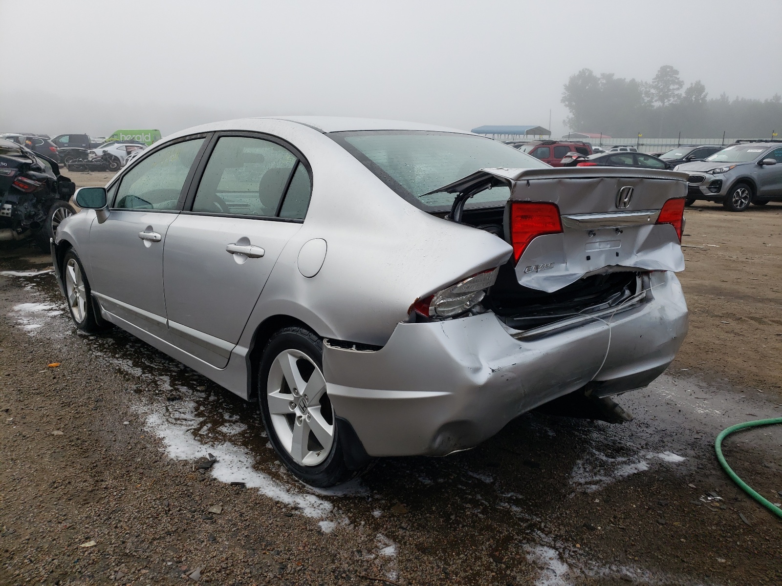 Photo 3 from auction – 2011 HONDA CIVIC LX-S with VIN 19XFA1F65BE015242