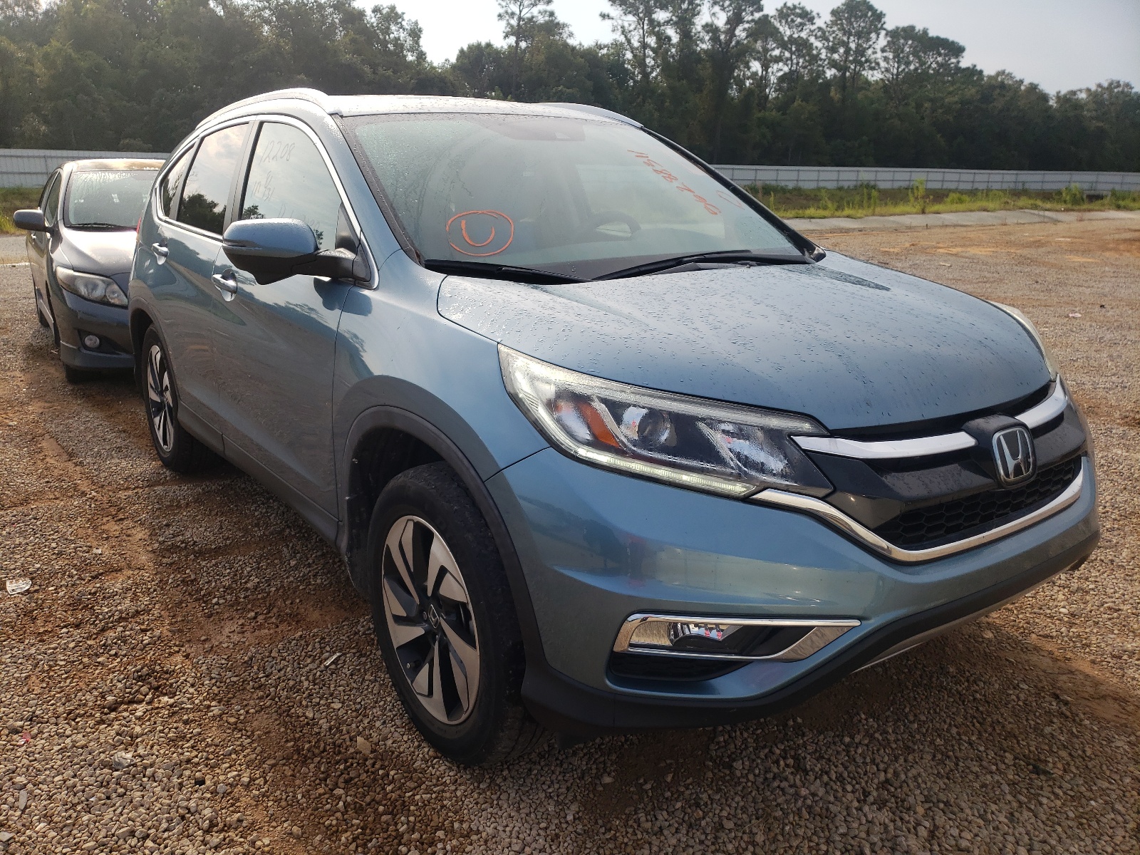 Photo 1 from auction – 2016 HONDA CR-V TOURI with VIN 5J6RM4H90GL013680