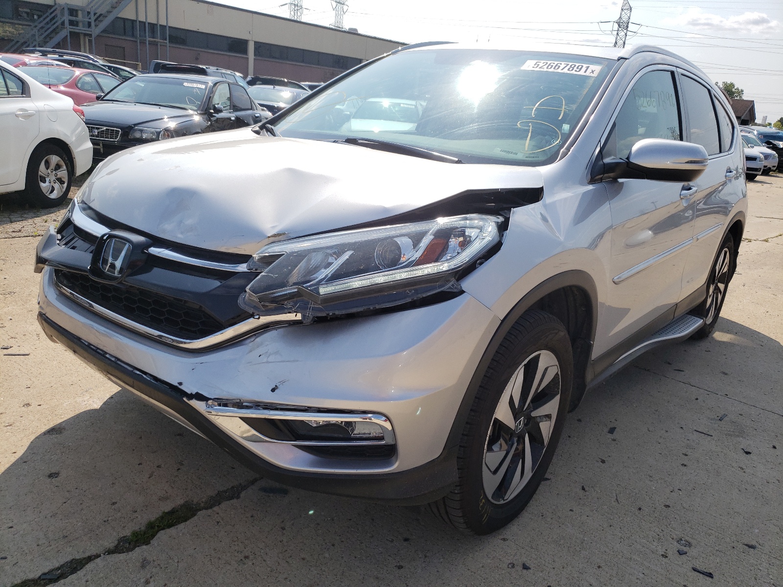 Photo 2 from auction – 2016 HONDA CR-V TOURI with VIN 5J6RM4H98GL075991
