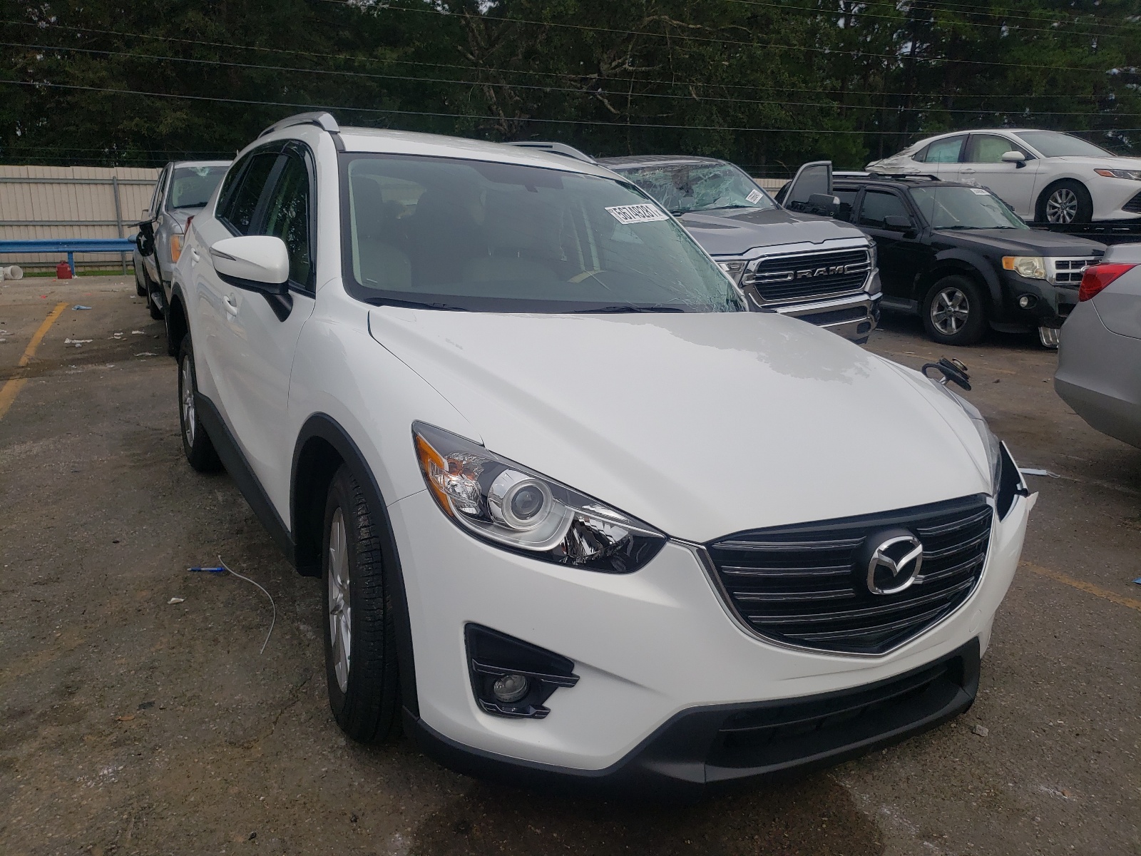 MAZDA CX-5 TOURI 2016 with VIN JM3KE2CYXG0870492 - Photo from auction