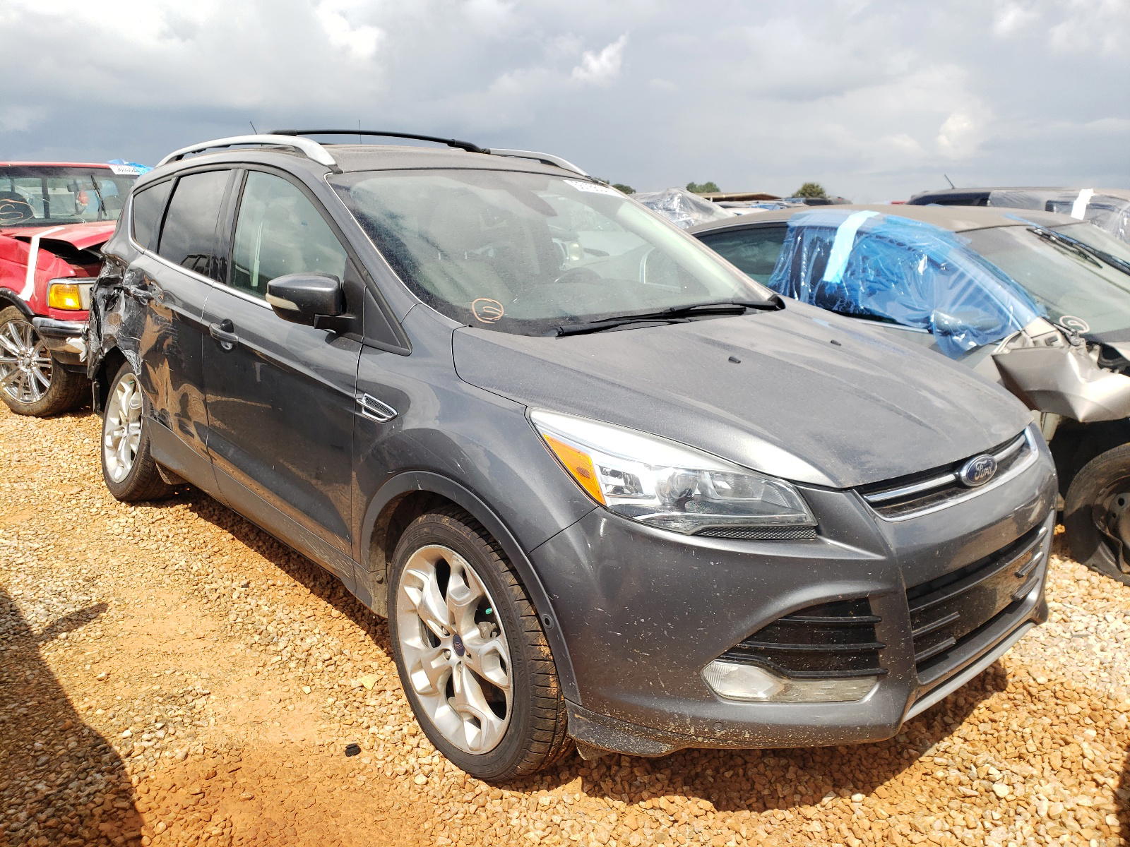 FORD ESCAPE TIT 2014 with VIN 1FMCU0J93EUB83341 - Photo from auction