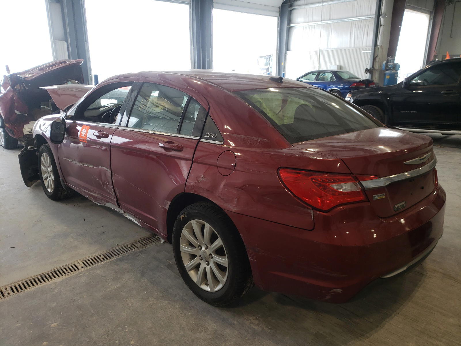 Photo 3 from auction – 2013 CHRYSLER 200 TOURIN with VIN 1C3CCBBG9DN531981