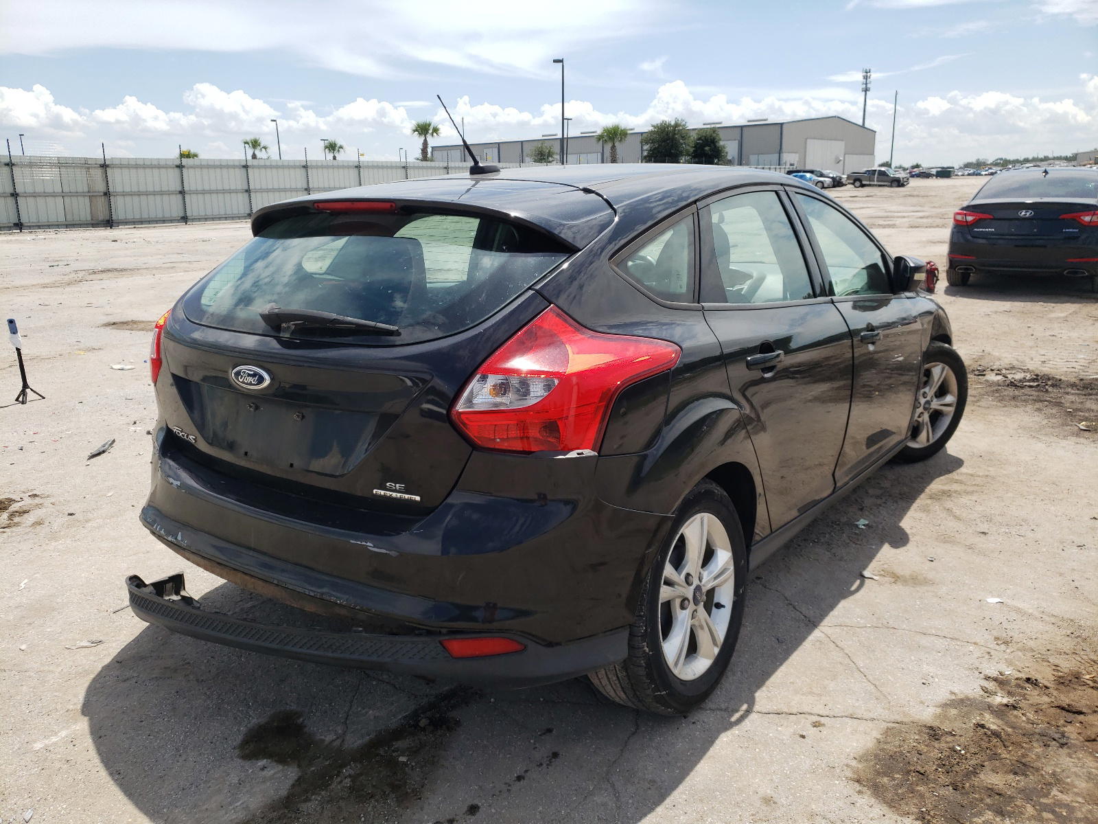 Photo 4 from auction – 2013 FORD FOCUS SE with VIN 1FADP3K26DL336128