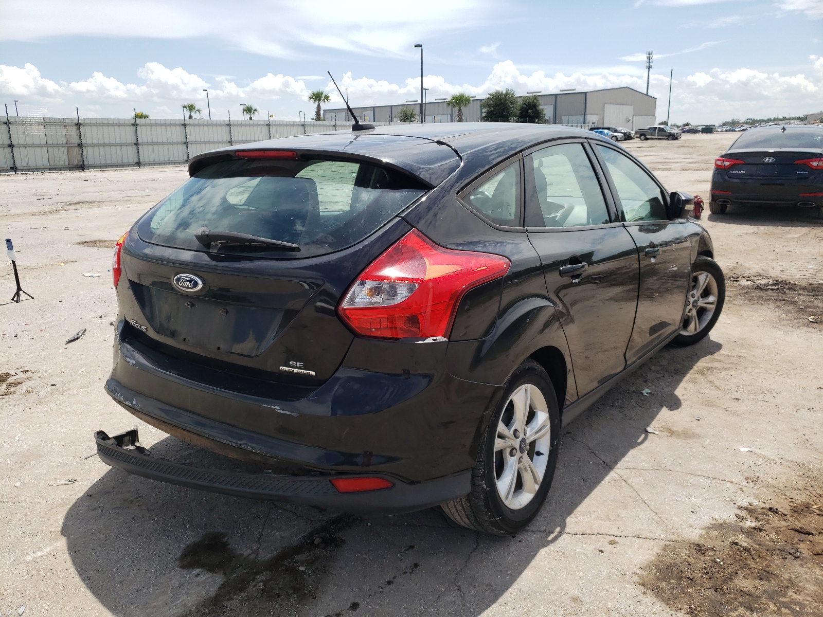 Foto 4 de la subasta – 2013 FORD FOCUS SE con VIN 1FADP3K26DL336128