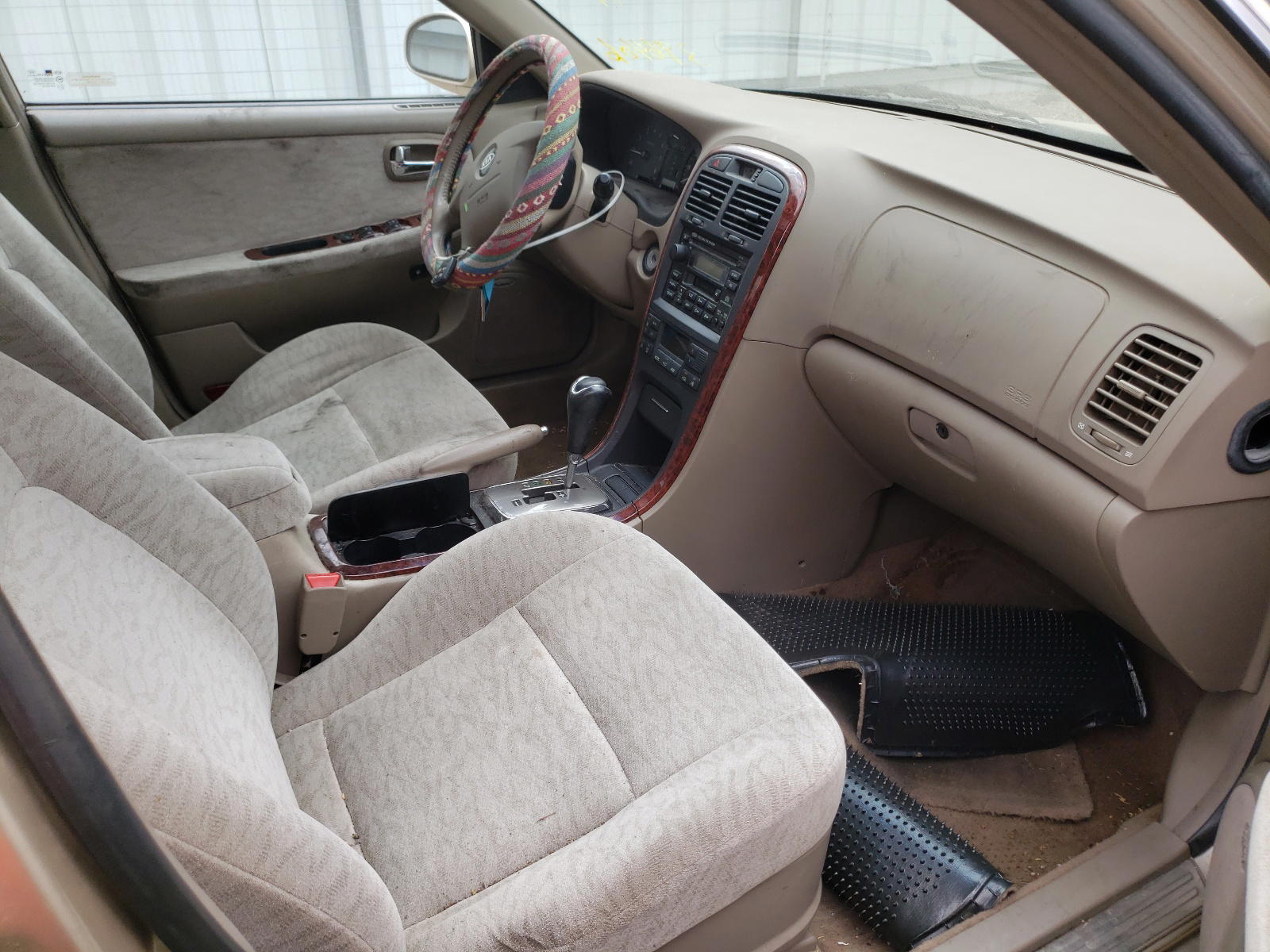 Photo 5 from auction – 2005 KIA OPTIMA LX with VIN KNAGD128655396406