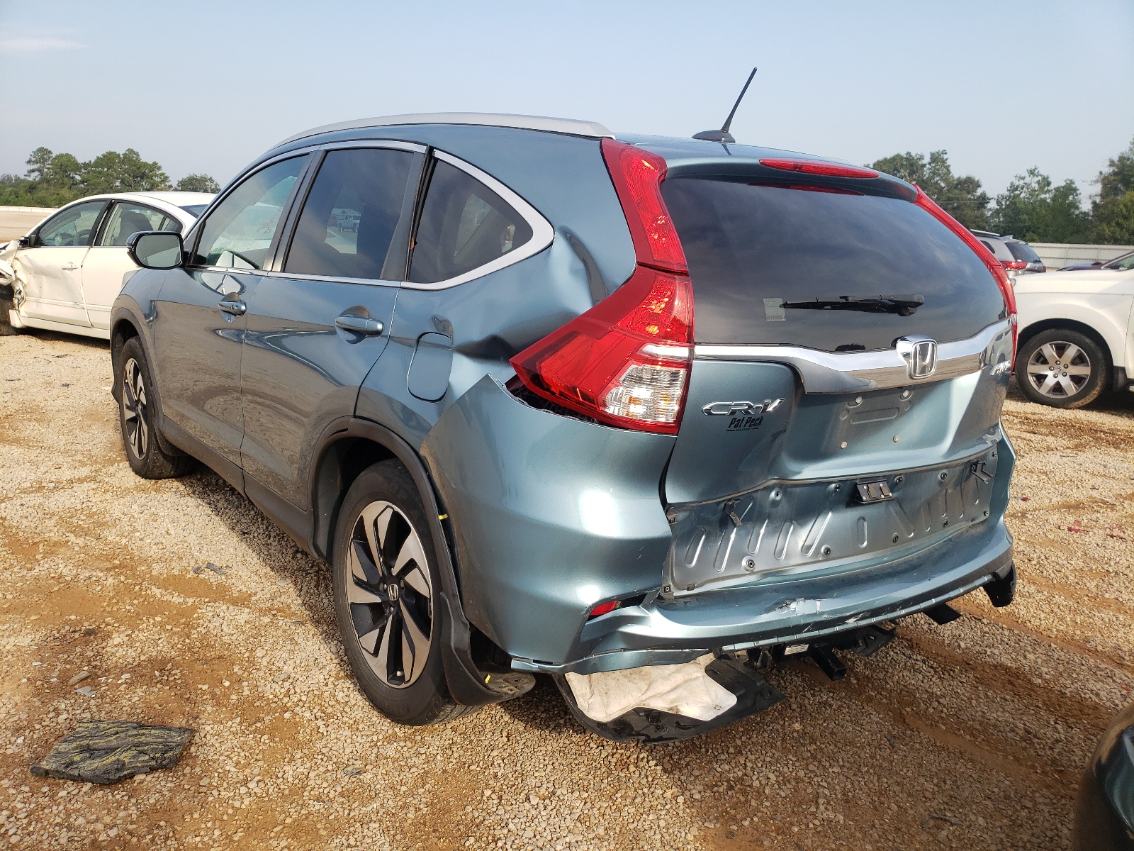 Photo 3 from auction – 2016 HONDA CR-V TOURI with VIN 5J6RM4H90GL013680