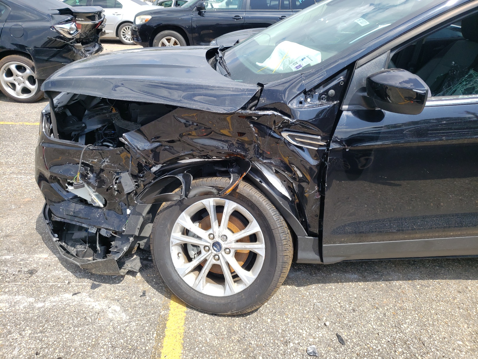 Photo 9 from auction – 2019 FORD ESCAPE SE with VIN 1FMCU0GD8KUA29778