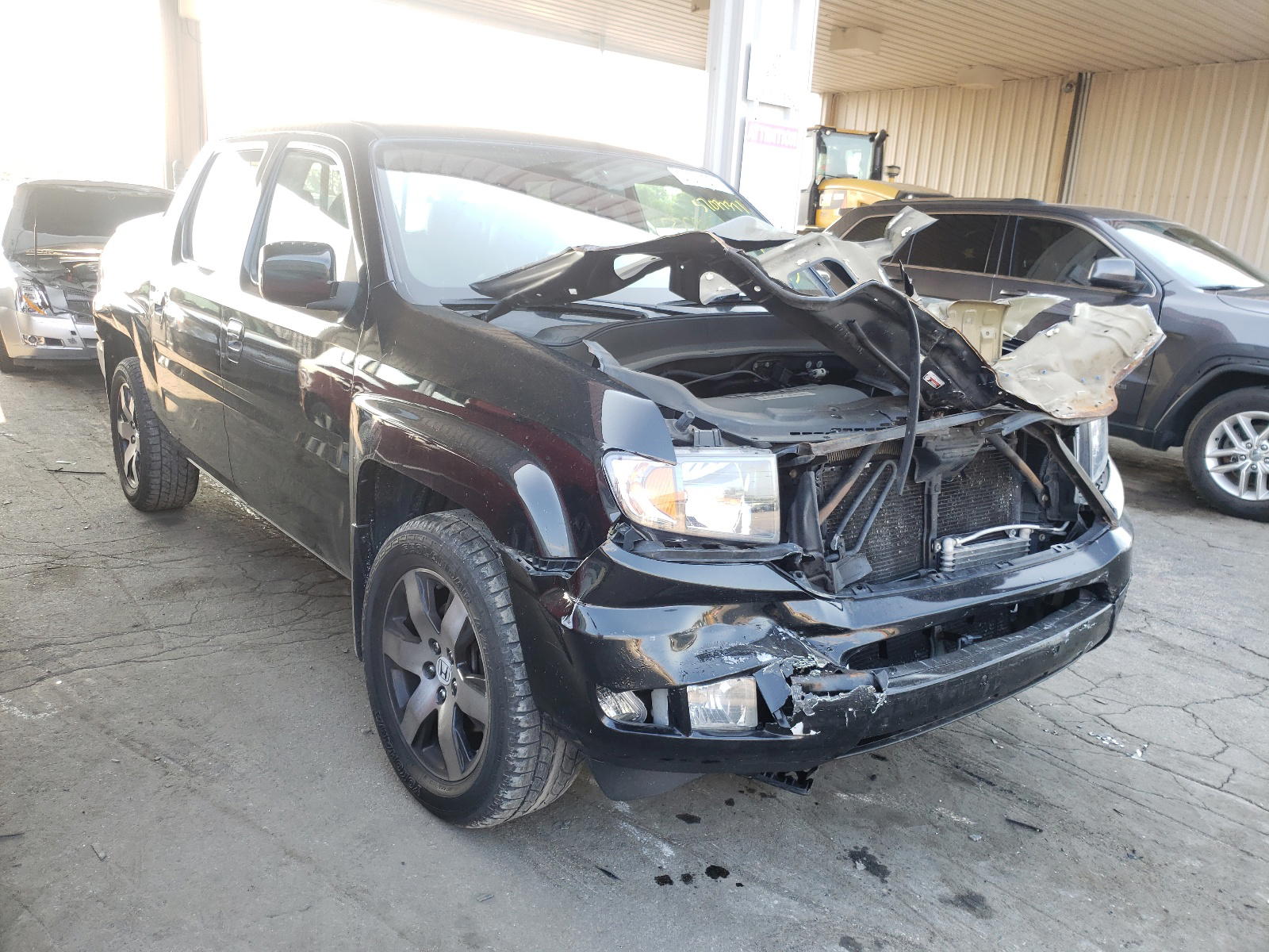 HONDA RIDGELINE 2014 with VIN 5FPYK1F61EB005786 - Photo from auction