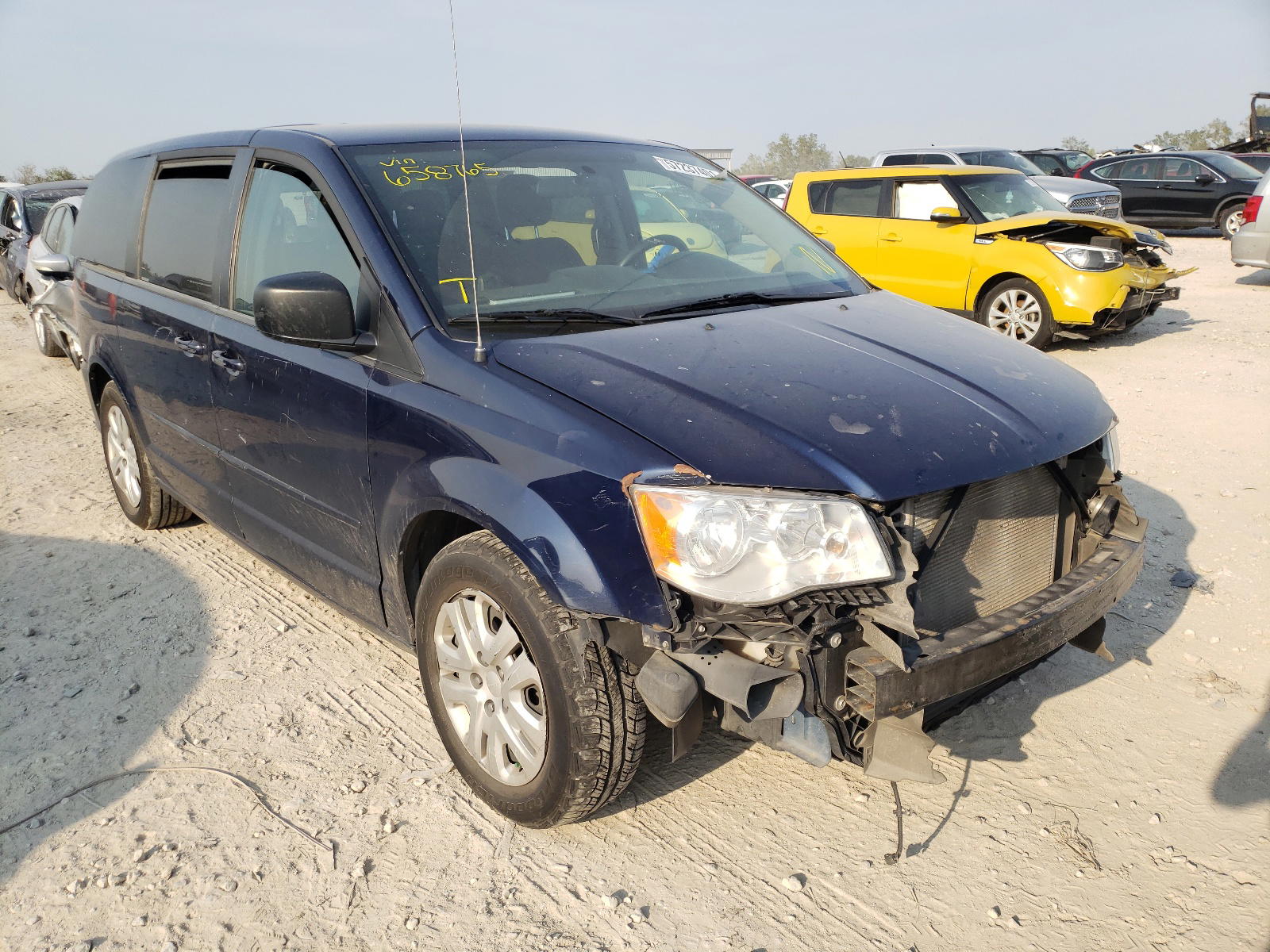 DODGE GRAND CARA 2015 with VIN 2C4RDGBG5FR658765 - Photo from auction