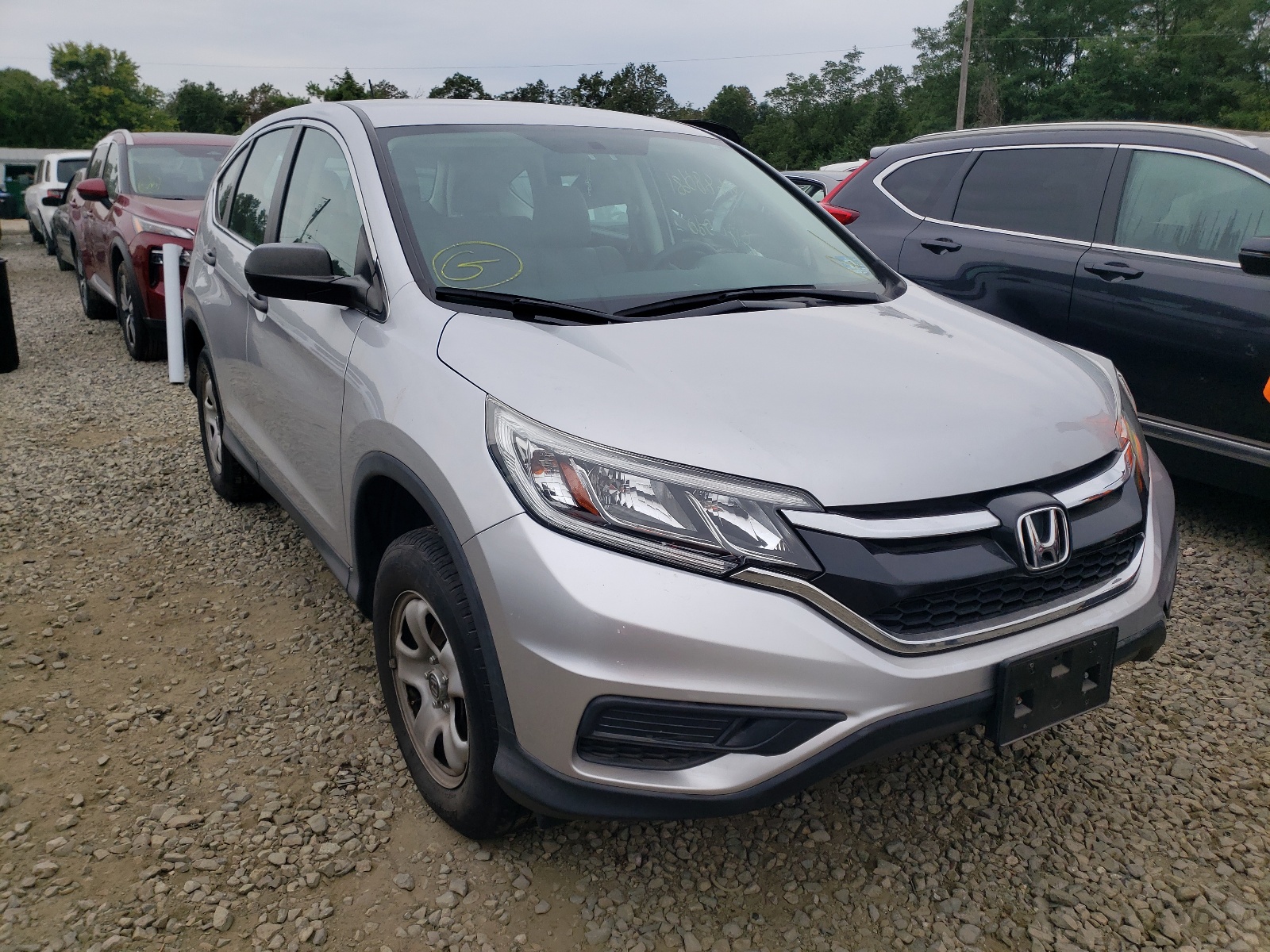 Photo 1 from auction – 2015 HONDA CR-V LX with VIN 2HKRM4H34FH696536