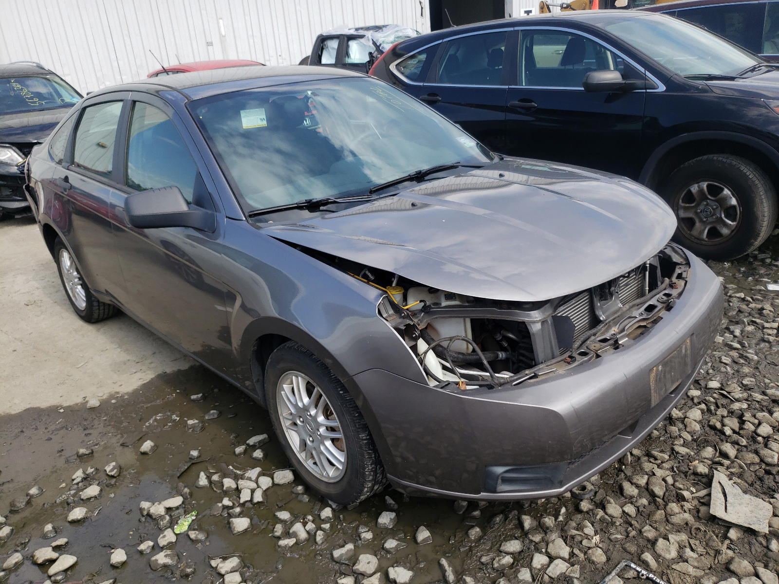 FORD FOCUS SE 2011 with VIN 1FAHP3FN8BW139642 - Photo from auction