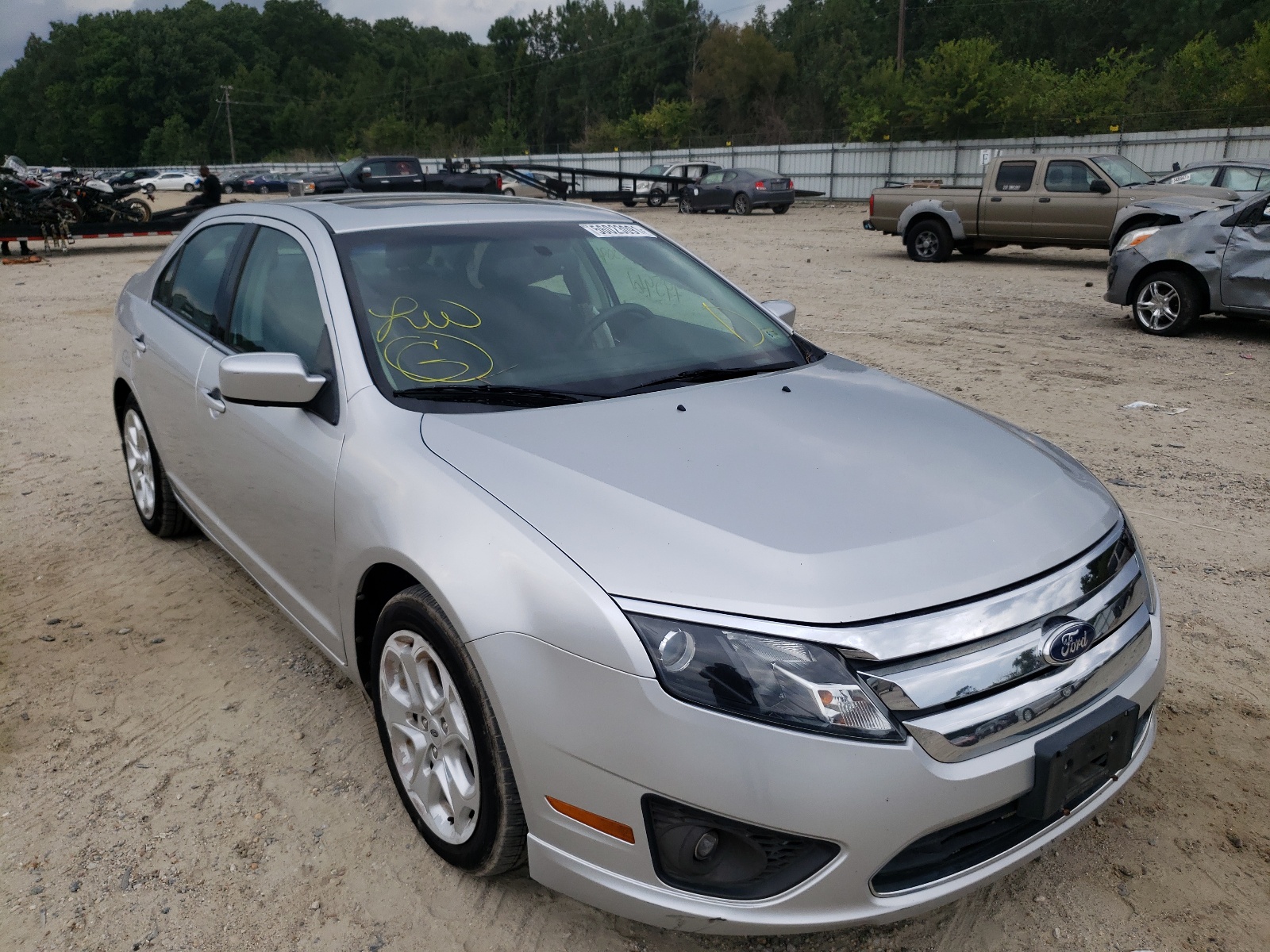FORD FUSION 2011 with VIN 3FAHP0HA0BR250312 - Photo from auction