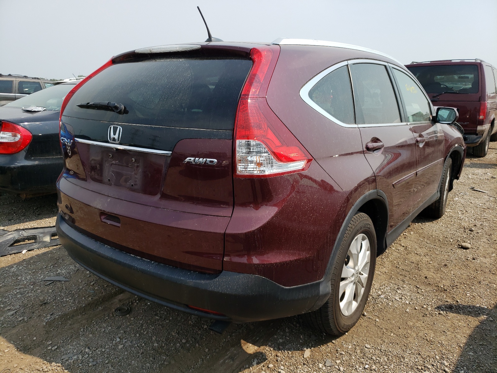 Photo 4 from auction – 2013 HONDA CR-V EXL with VIN 5J6RM4H70DL074411