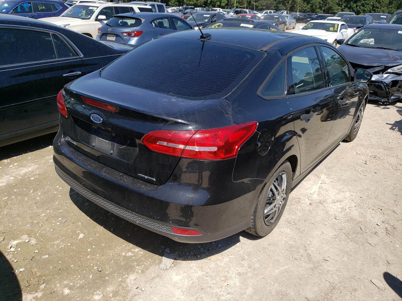 Photo 4 from auction – 2015 FORD FOCUS S with VIN 1FADP3E24FL299661