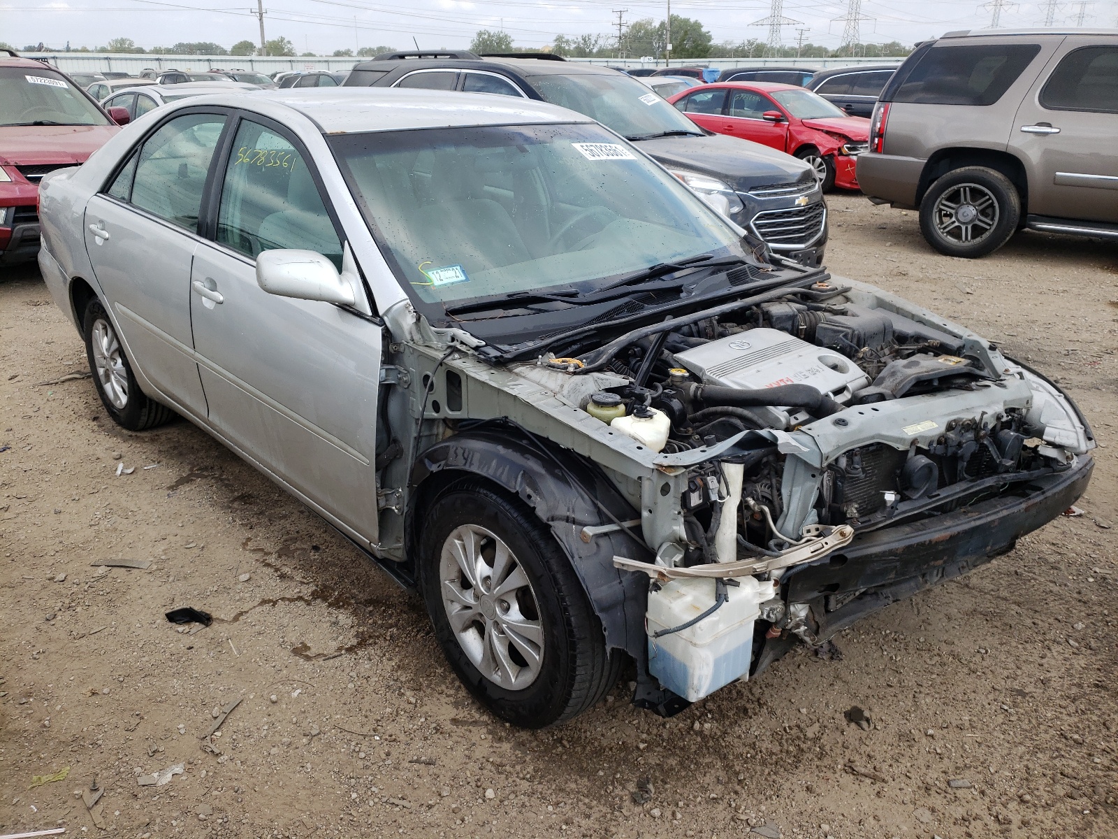 TOYOTA CAMRY LE 2005 with VIN 4T1BF32K45U606355 - Photo from auction