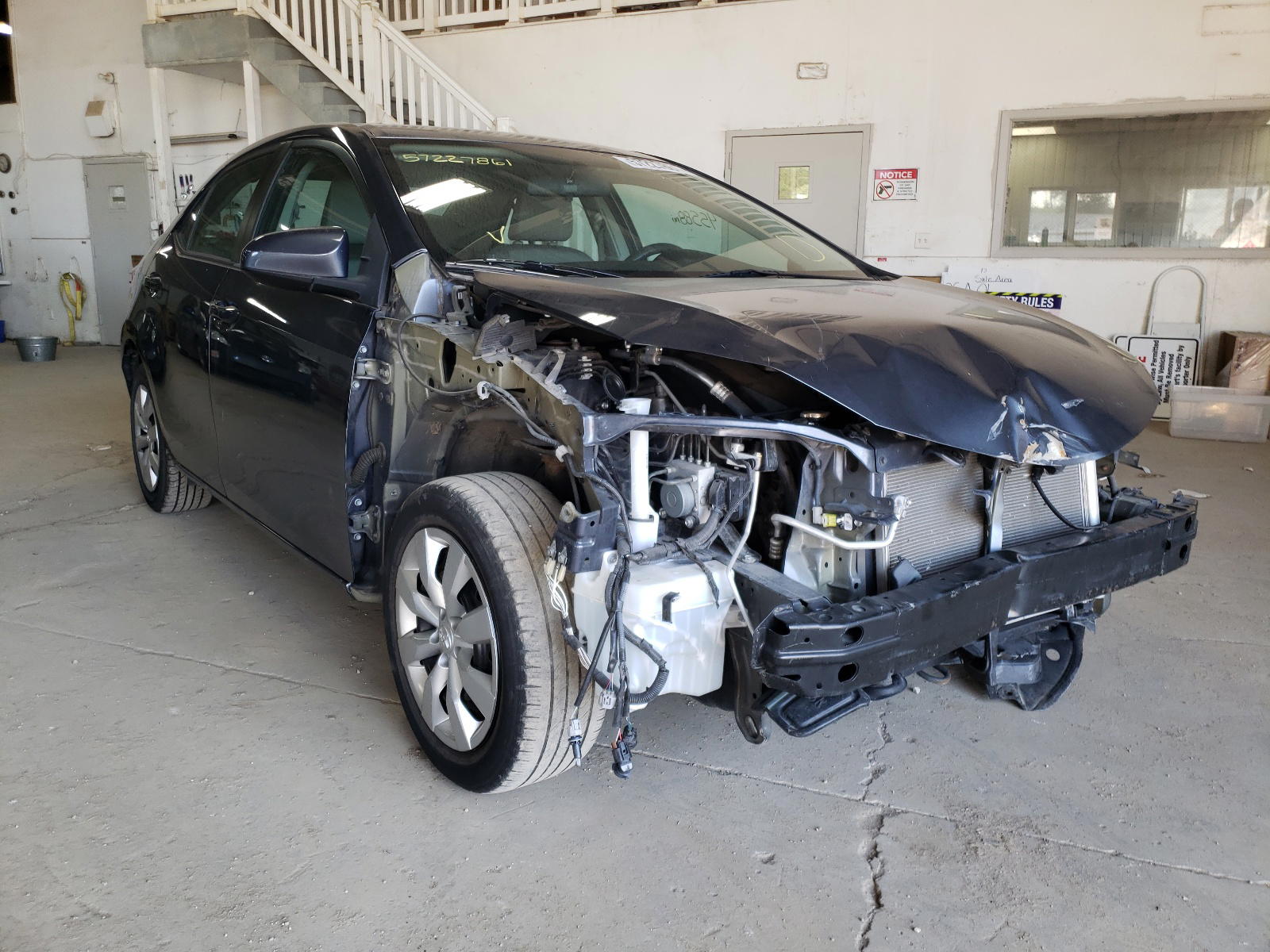 TOYOTA COROLLA L 2015 with VIN 5YFBURHE4FP236246 - Photo from auction