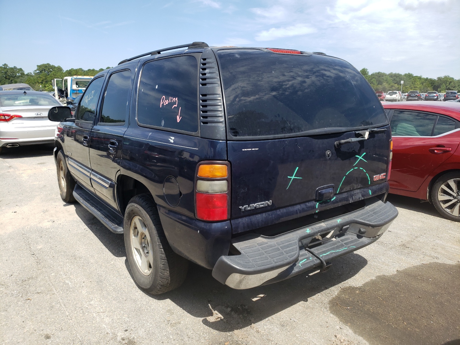 Photo 3 from auction – 2004 GMC YUKON with VIN 1GKEC13V64J155442
