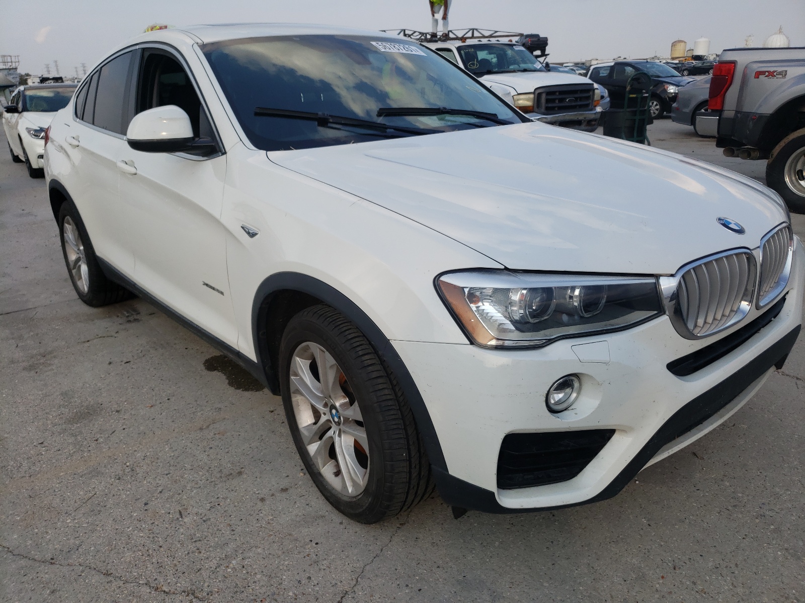 BMW X4 XDRIVE2 2015 with VIN 5UXXW3C56F0F88874 - Photo from auction
