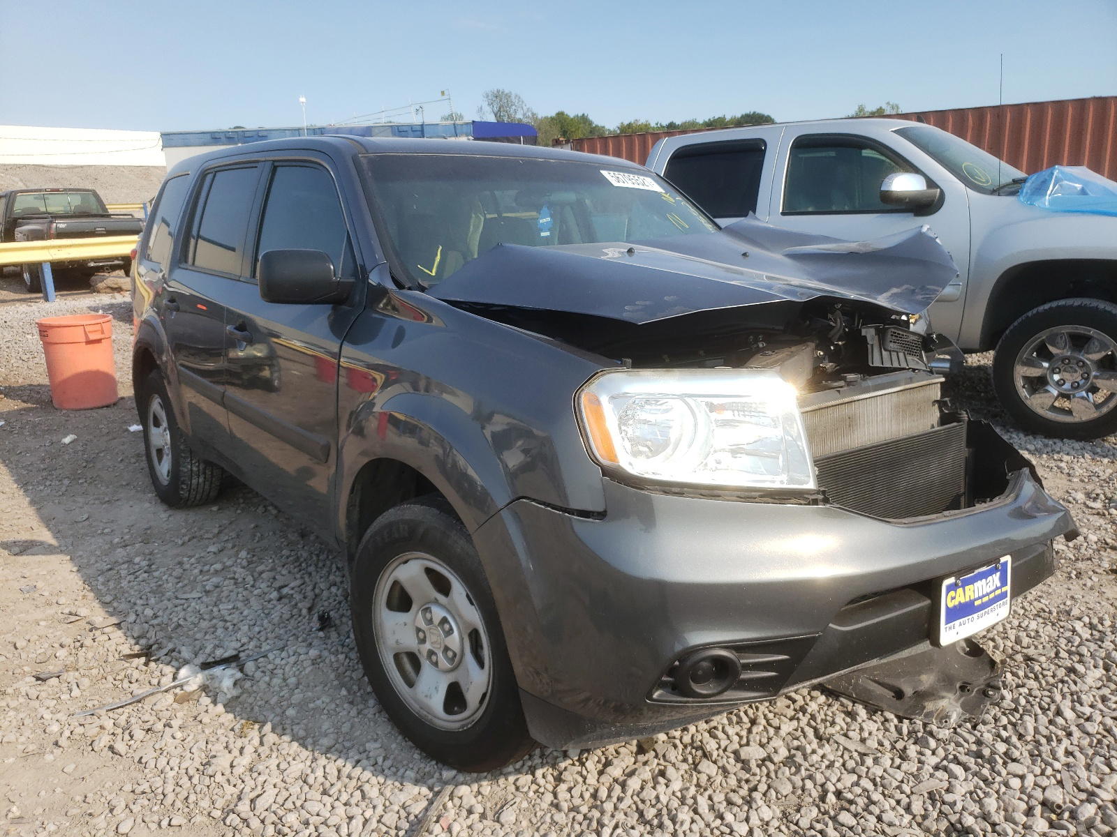 HONDA PILOT LX 2014 with VIN 5FNYF3H27EB023082 - Photo from auction