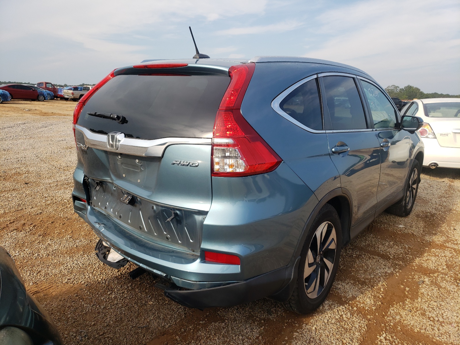 Photo 4 from auction – 2016 HONDA CR-V TOURI with VIN 5J6RM4H90GL013680